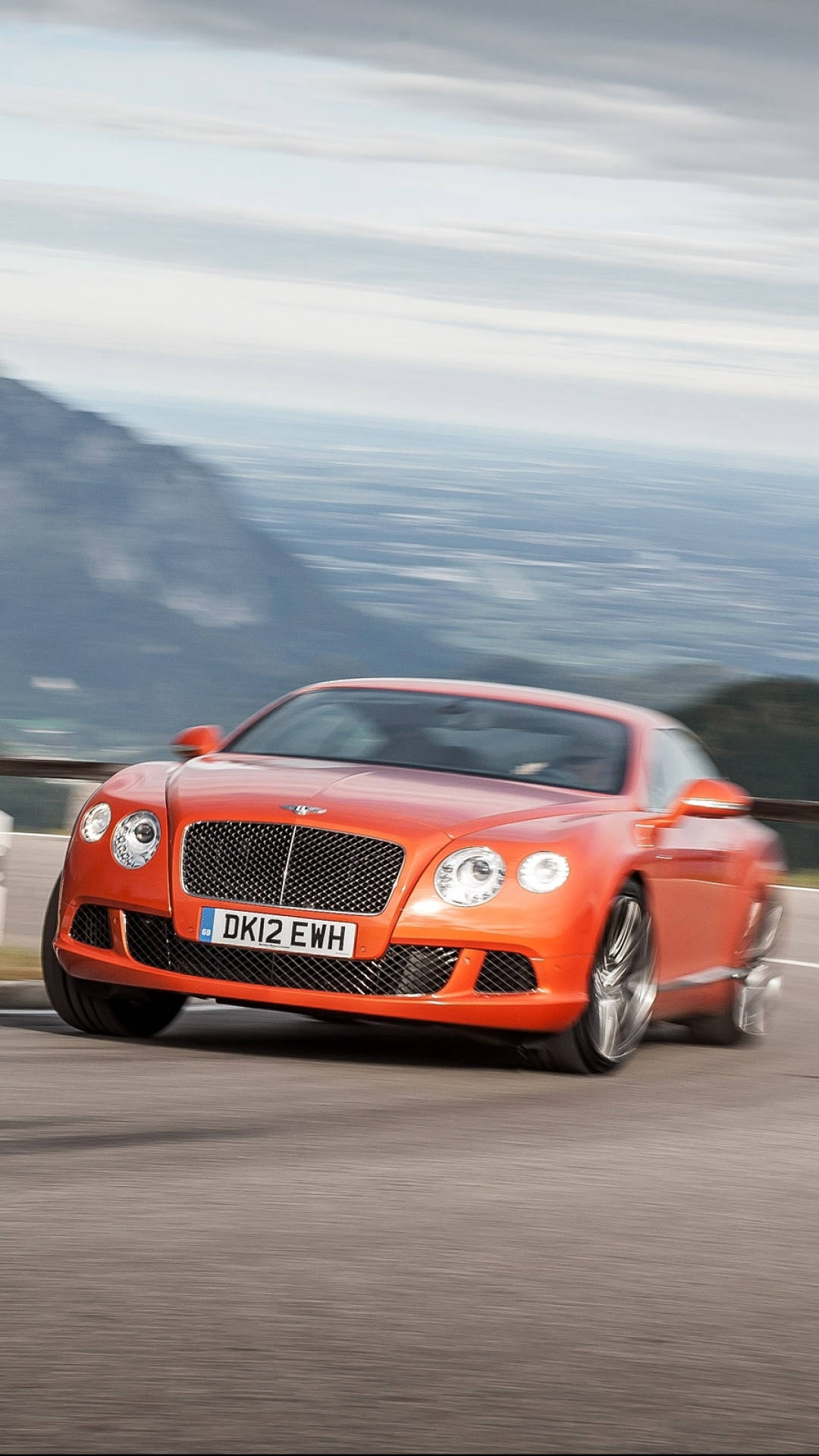 2004 Bentley Continental GT, vibrant orange, mountain road, Full HD Phone Wallpaper