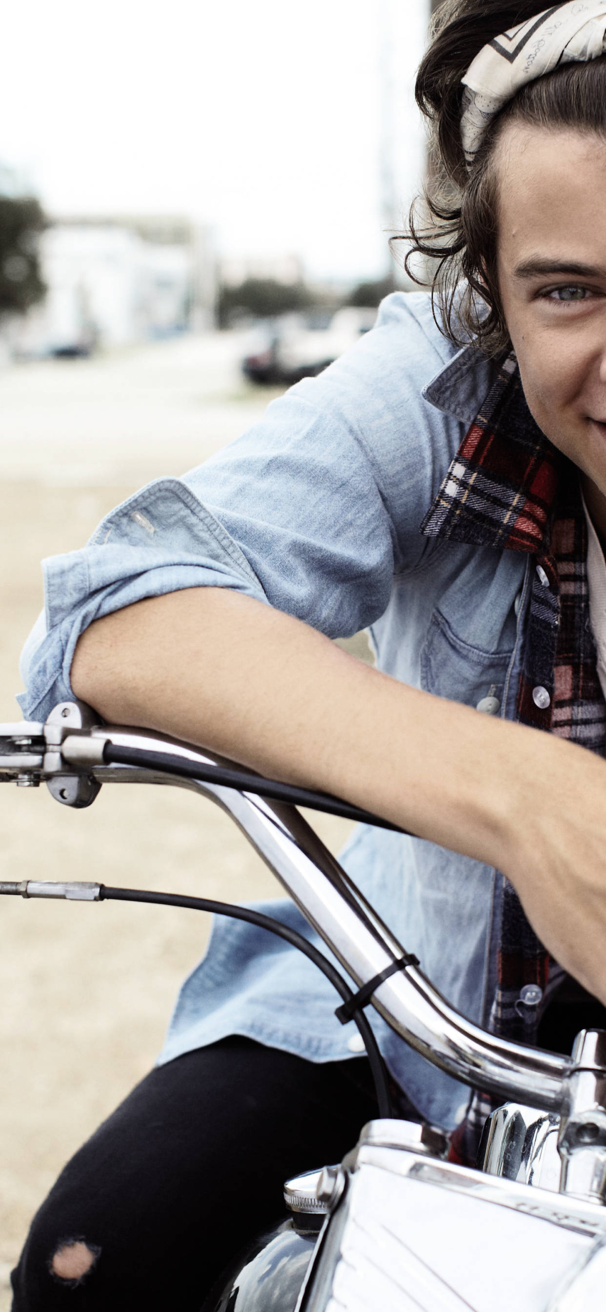 iPhone, Harry Styles, chrome motorcycle handlebar, 2K Phone Wallpaper