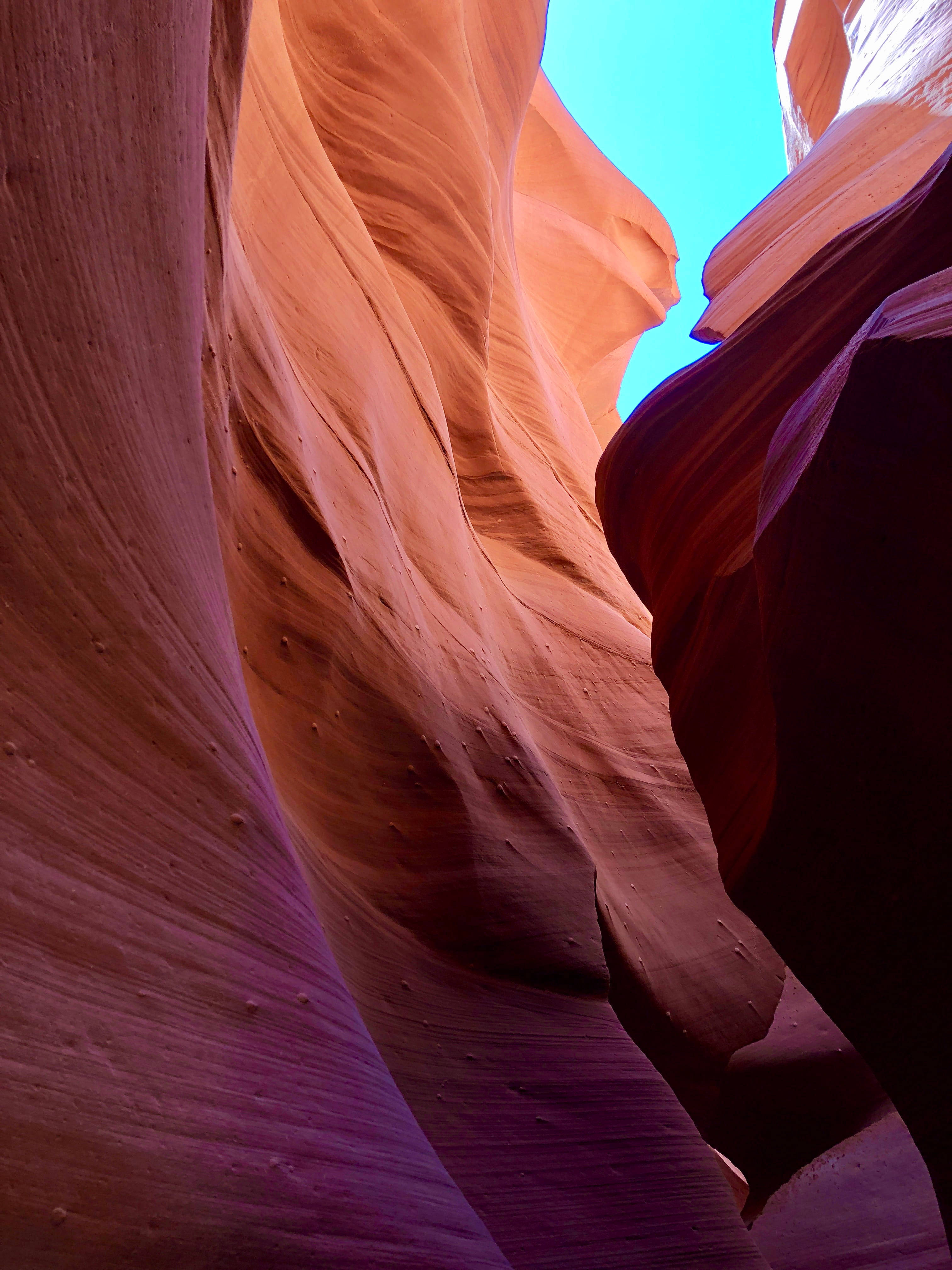 slot canyon, sandstone walls, warm hues, 4K Phone Wallpaper