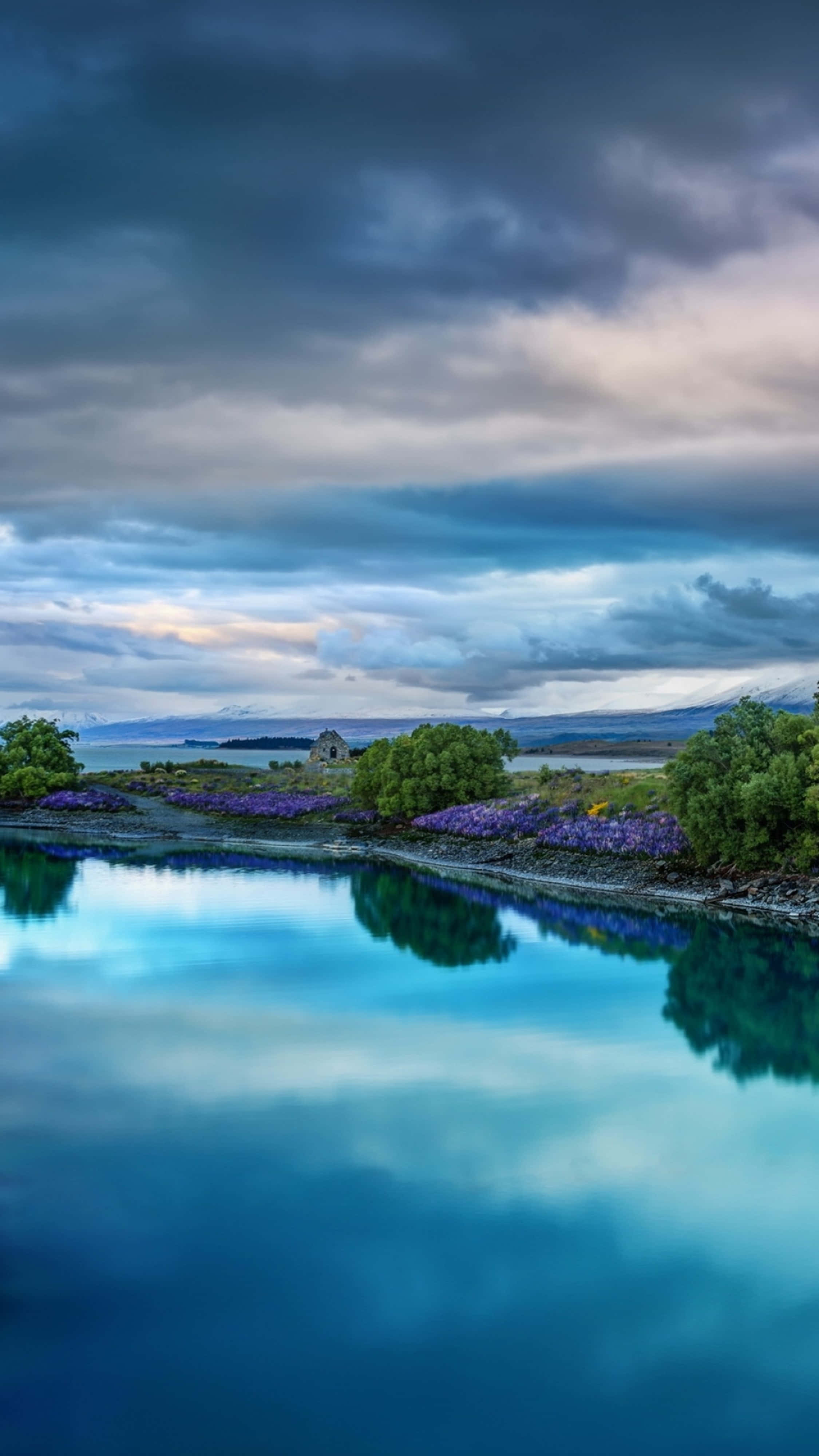 4K Nature iPhone Lagoon, serene lake, dramatic cloudy sky, 4K Phone Wallpaper