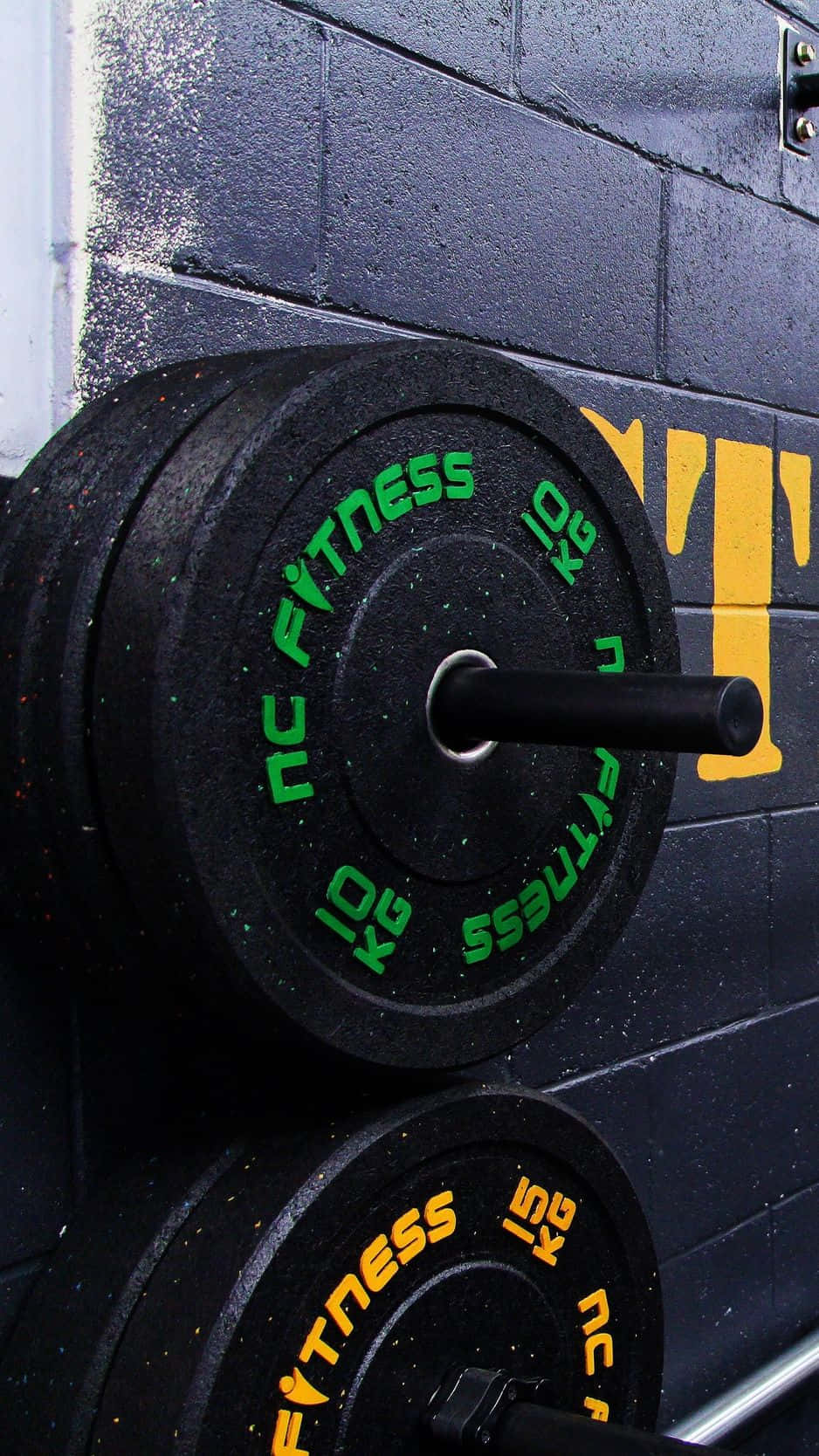 black weight plates, green text, dark brick gym wall, HD Phone Wallpaper