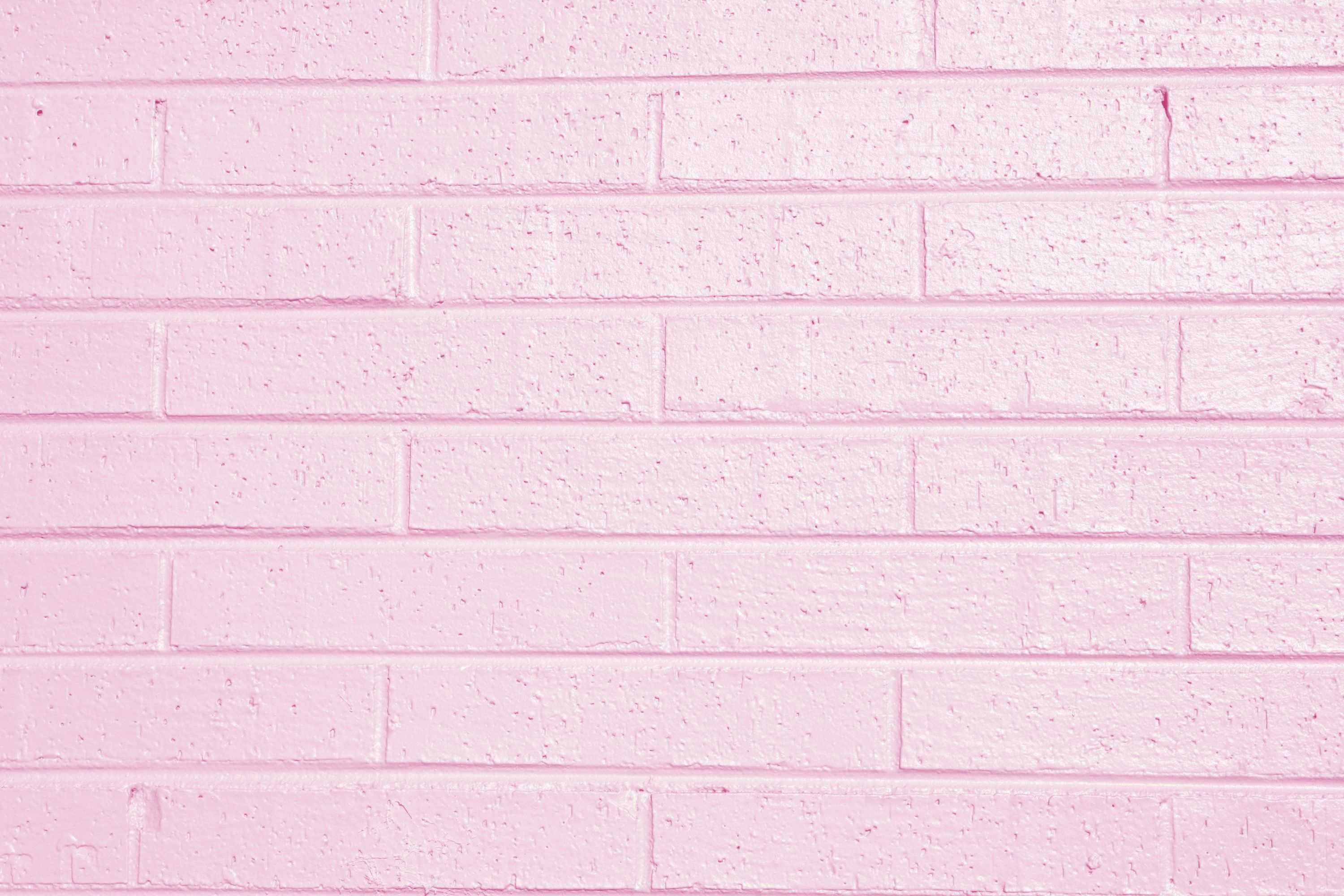 iPhone Pink Aesthetic, pink-painted brick wall, mortar lines, 2K Desktop Wallpaper