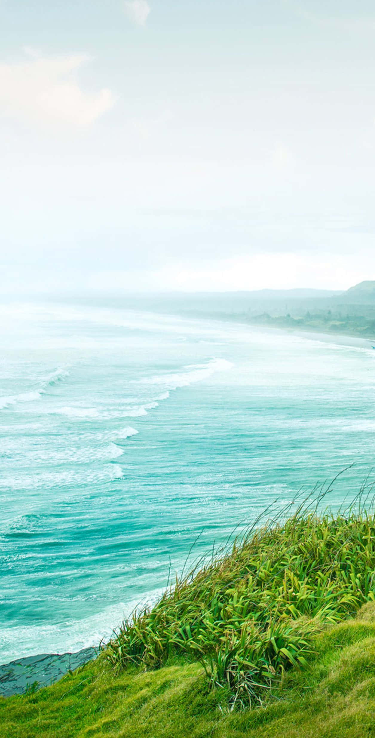 iPhone, misty coastal cliff, turquoise waves, Full HD Phone Wallpaper