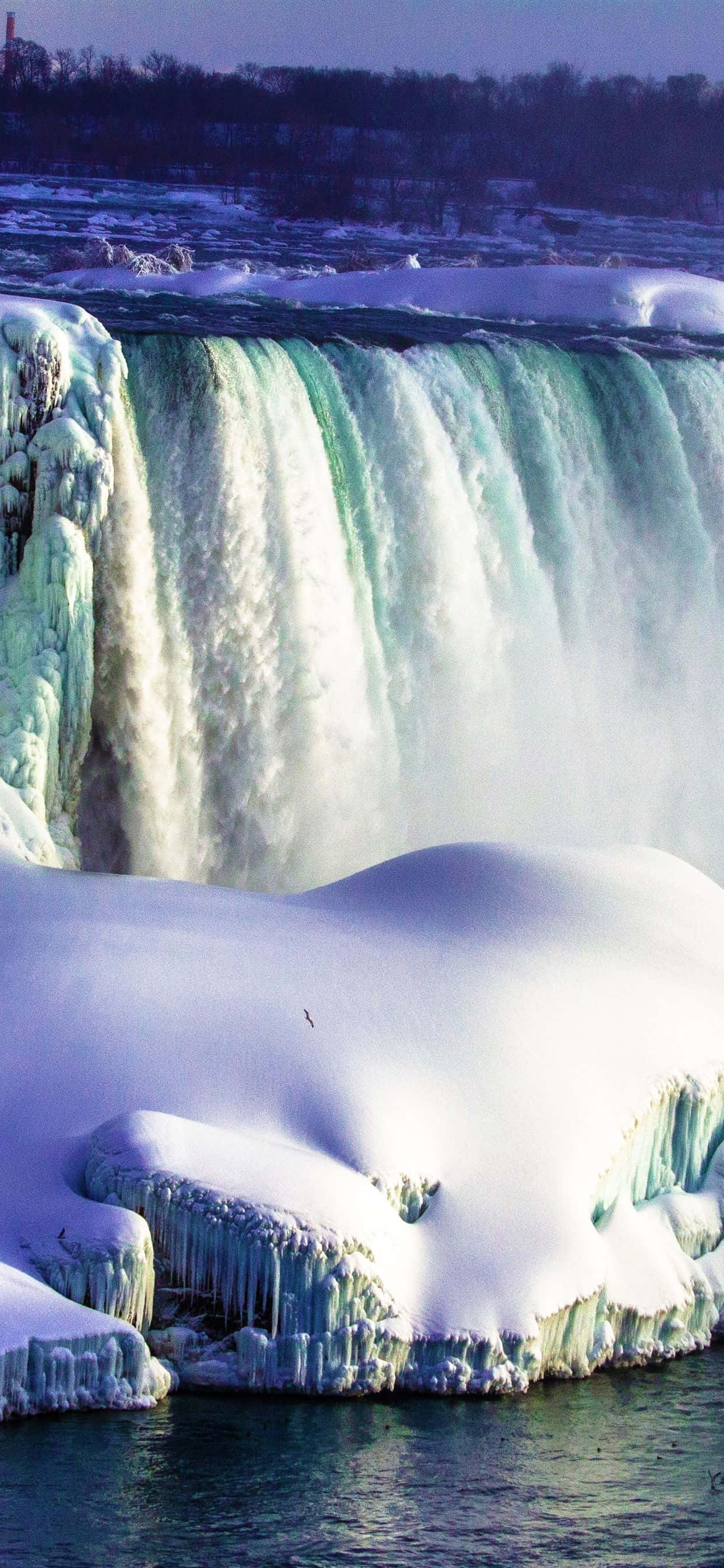 iPhone Waterfall, frozen waterfall, snow-covered cliffs, 2K Phone Wallpaper