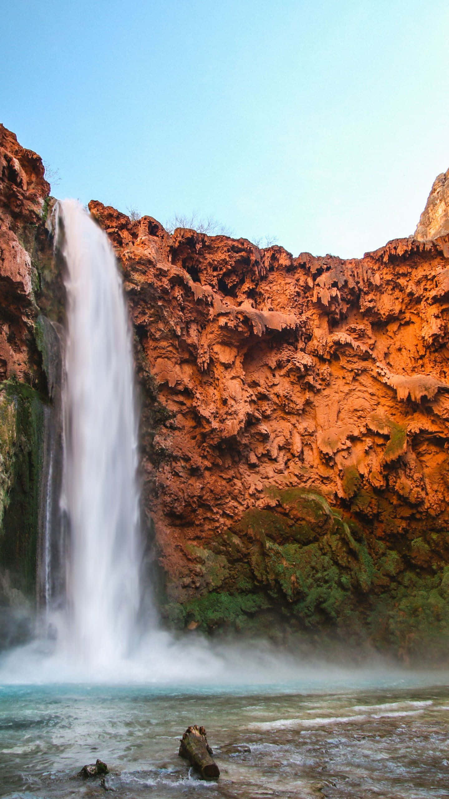 iPhone Waterfall, waterfall, rugged orange cliffs, 2K Phone Wallpaper