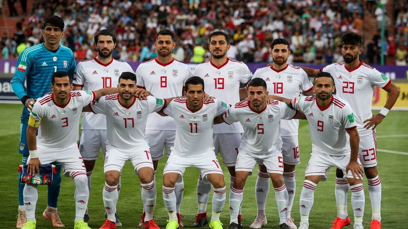 Iran National Football Team, white FIFA jersey, vibrant green pitch, SD Desktop Wallpaper