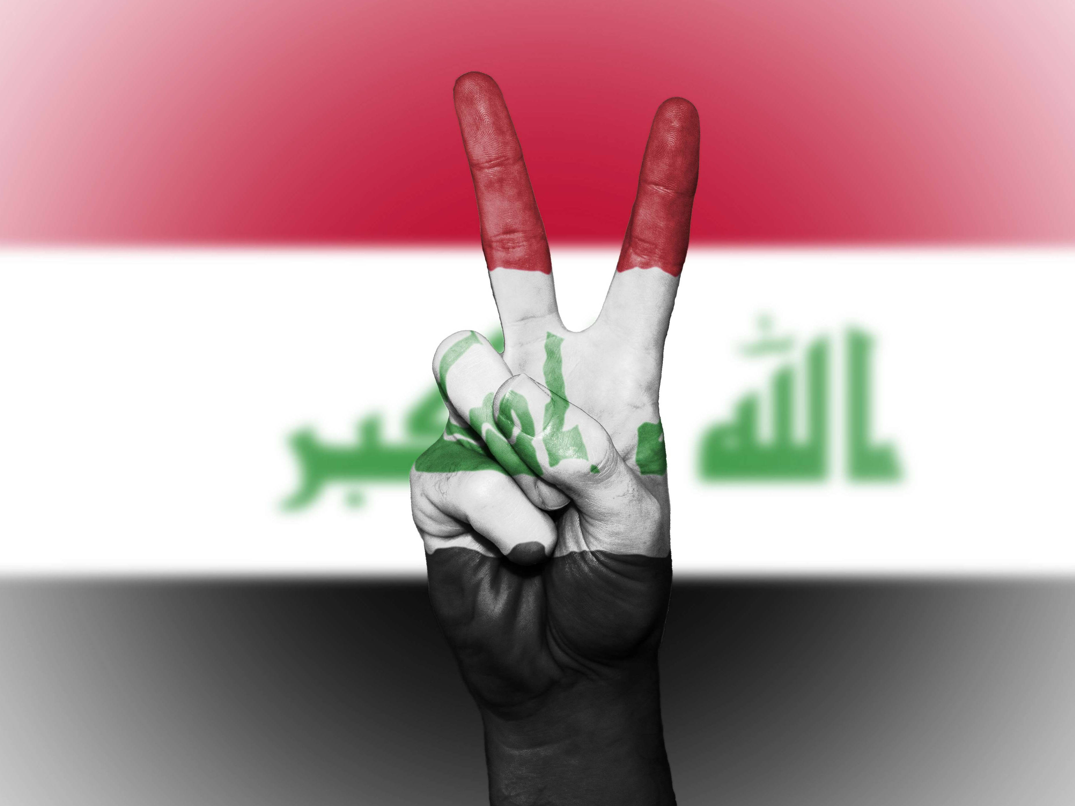 Iraq flag, peace hand sign, hand painted with Iraq's flag, 2K Desktop Wallpaper