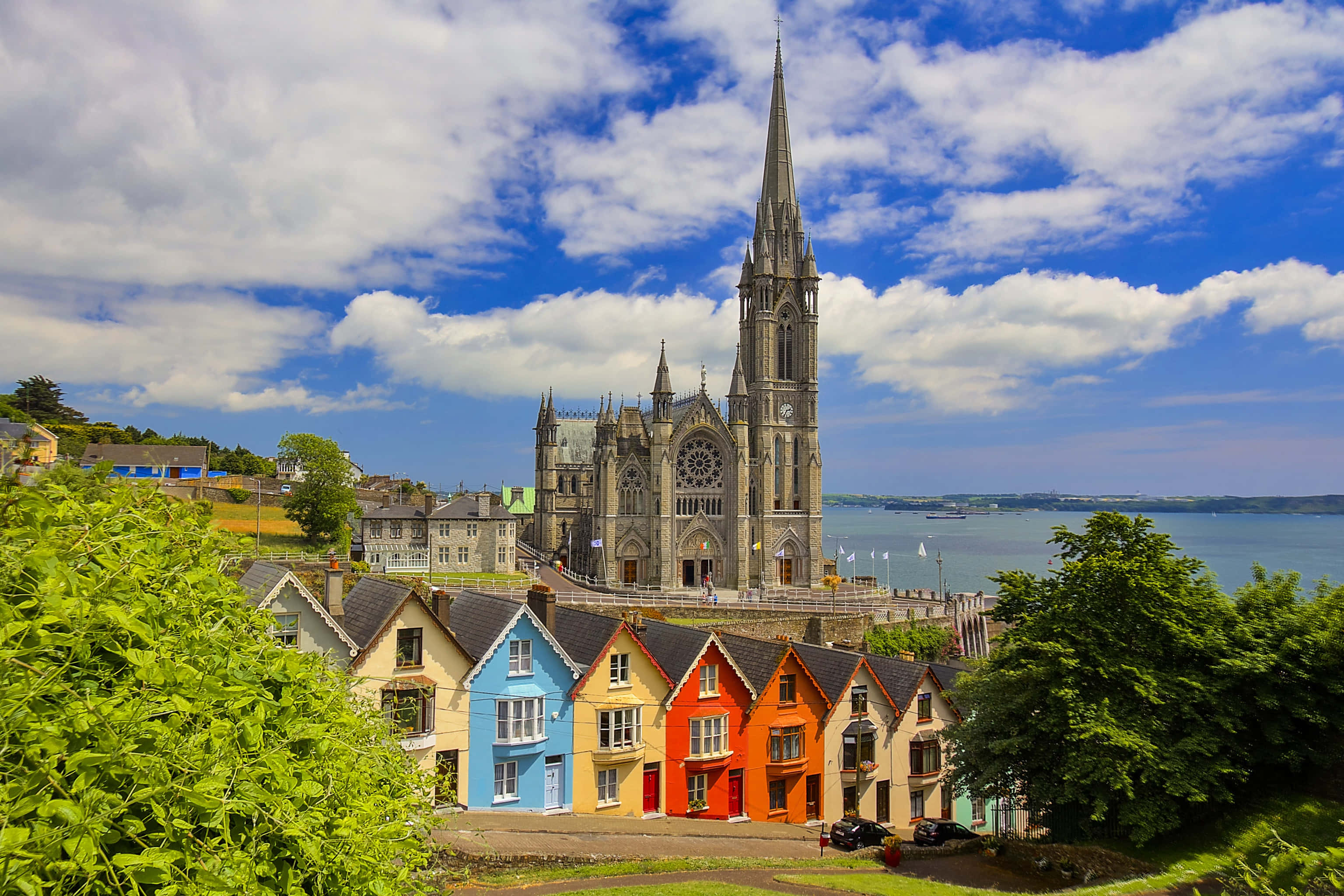 Ireland Desktop, Gothic cathedral, colorful houses, 2K Desktop Wallpaper