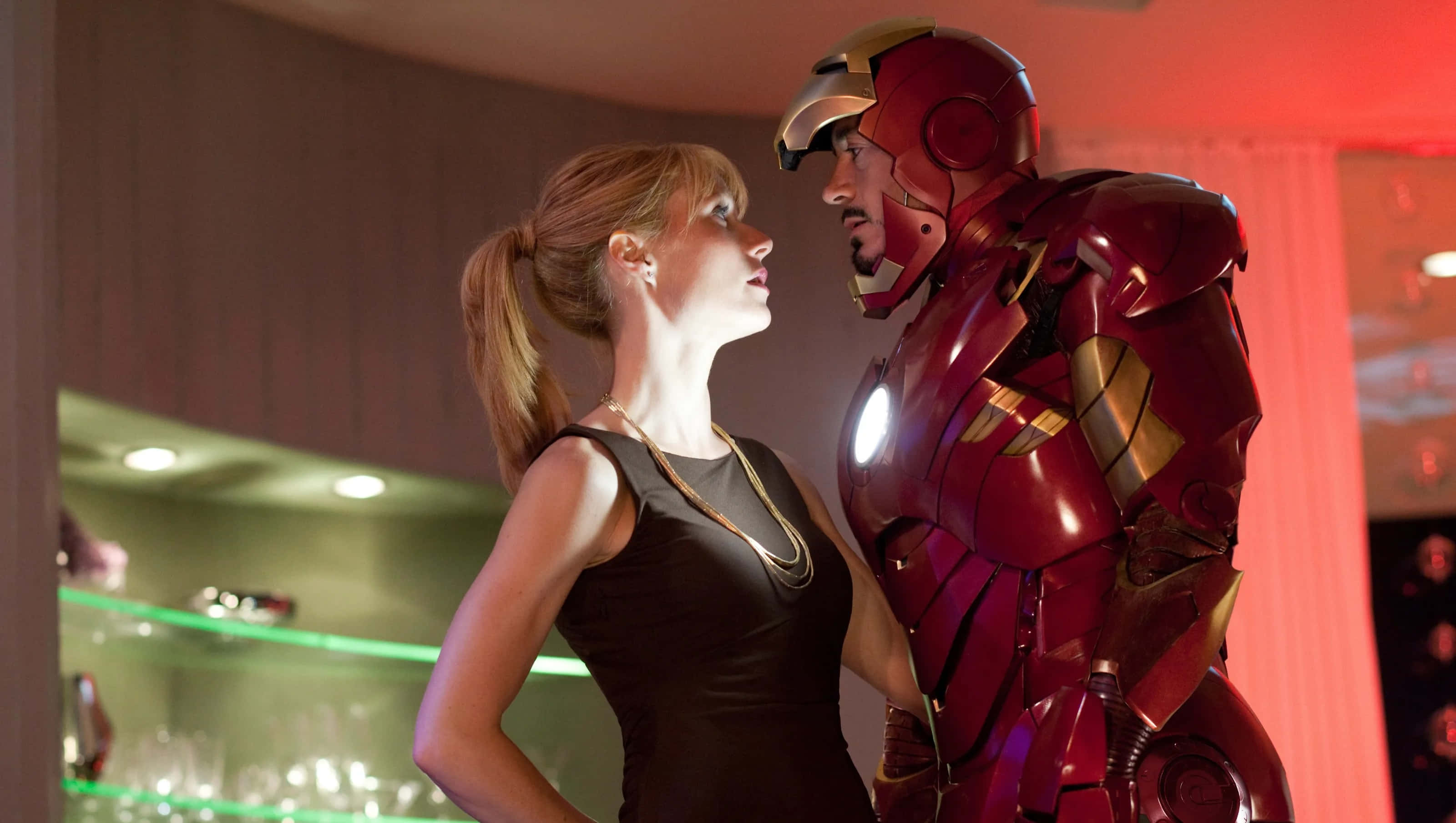 Iron Man, red and gold suit, dimly lit bar, 2K Desktop Wallpaper