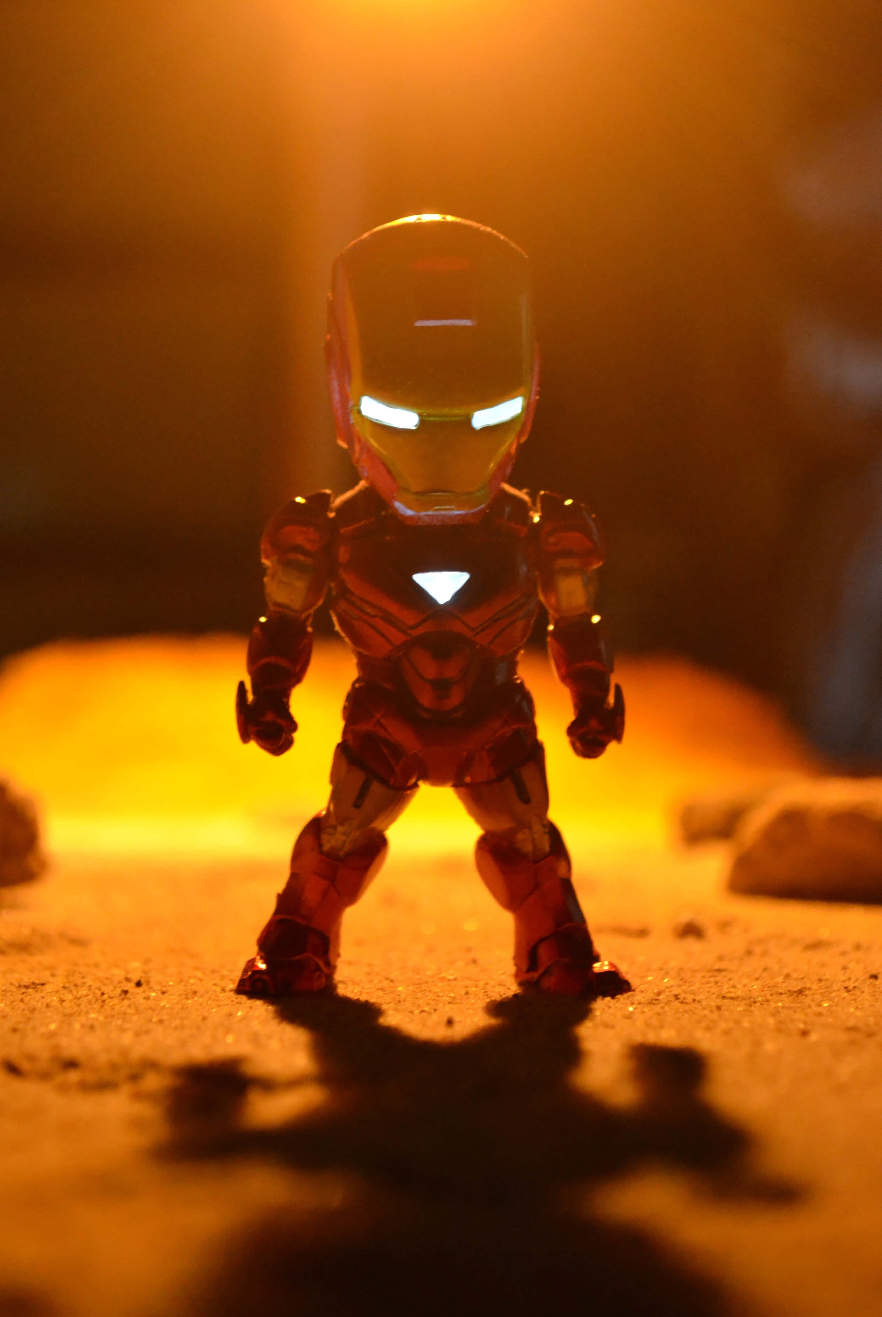 Iron Man Action Figures, golden light, textured surface, 4K Phone Wallpaper