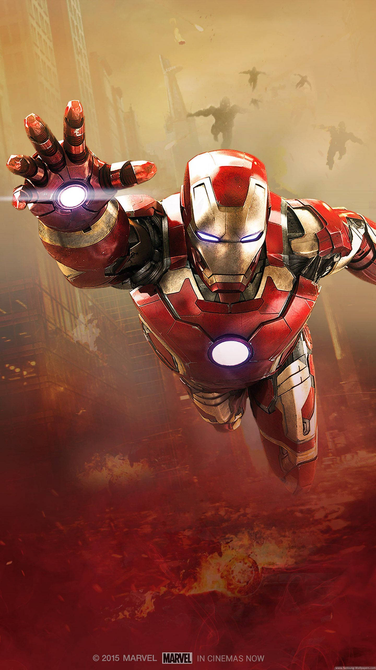 Iron Man, repulsor beams, fiery urban battlefield, 2K Phone Wallpaper