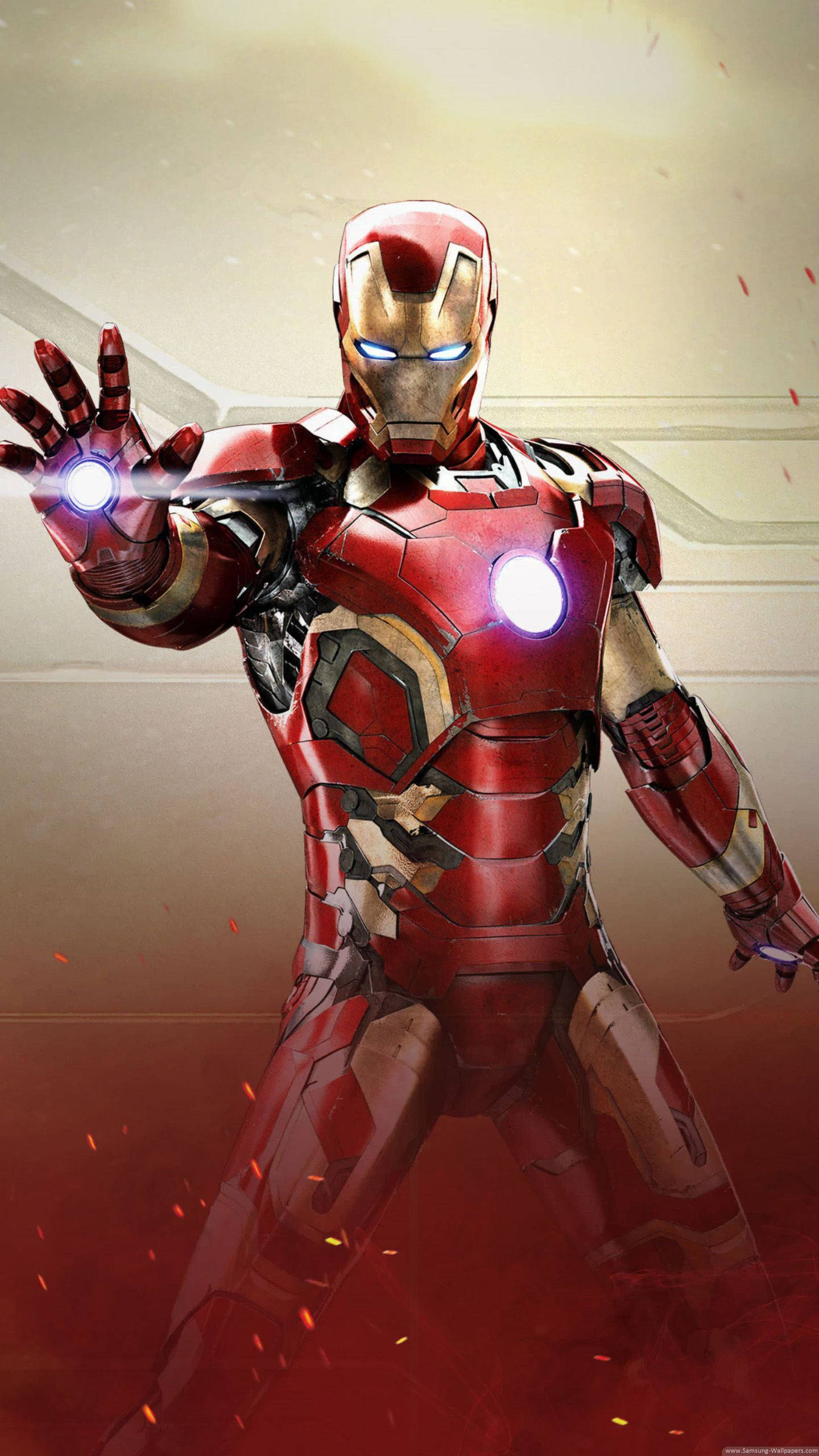 Iron Man, red and gold armor, glowing repulsors, 2K Phone Wallpaper