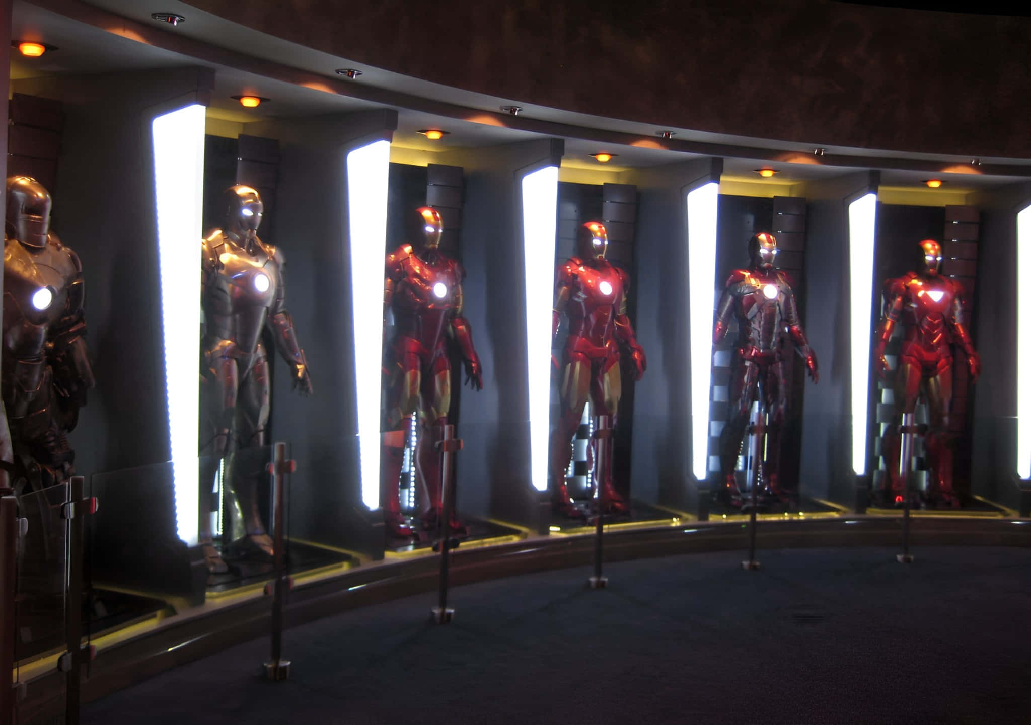 Iron Man Suit, six illuminated Iron Man suits, curved display case, Full HD Desktop Wallpaper