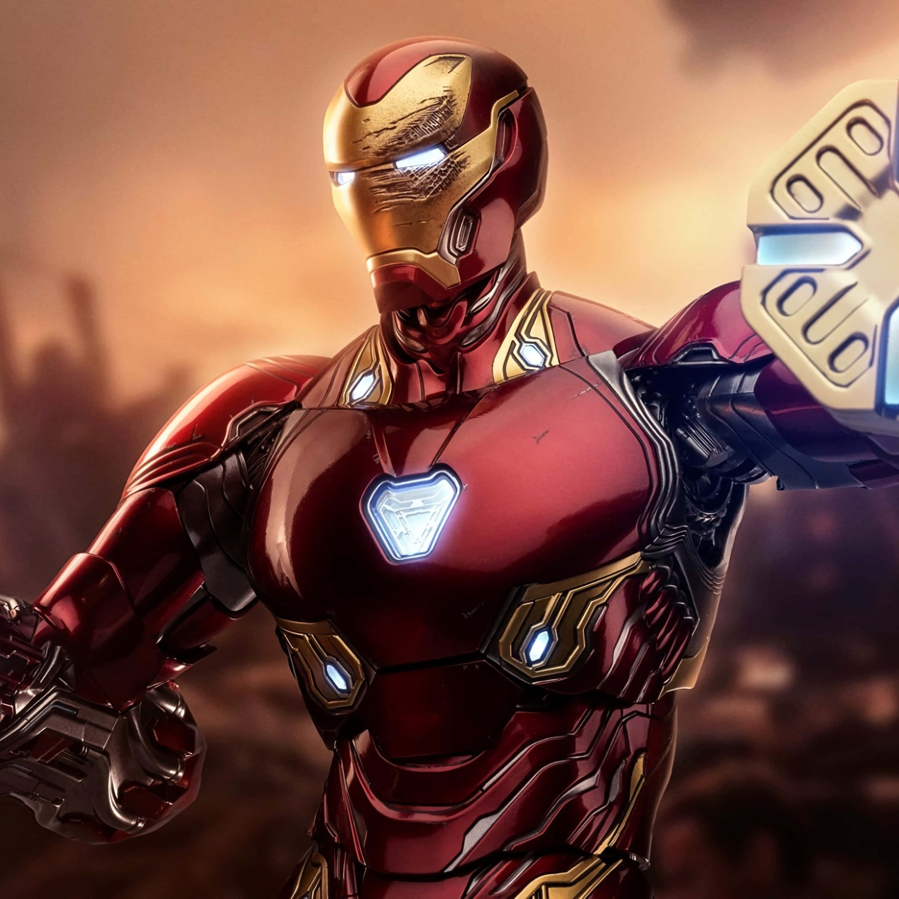 Iron Man, red gold armor, glowing repulsors, 2K Desktop Wallpaper