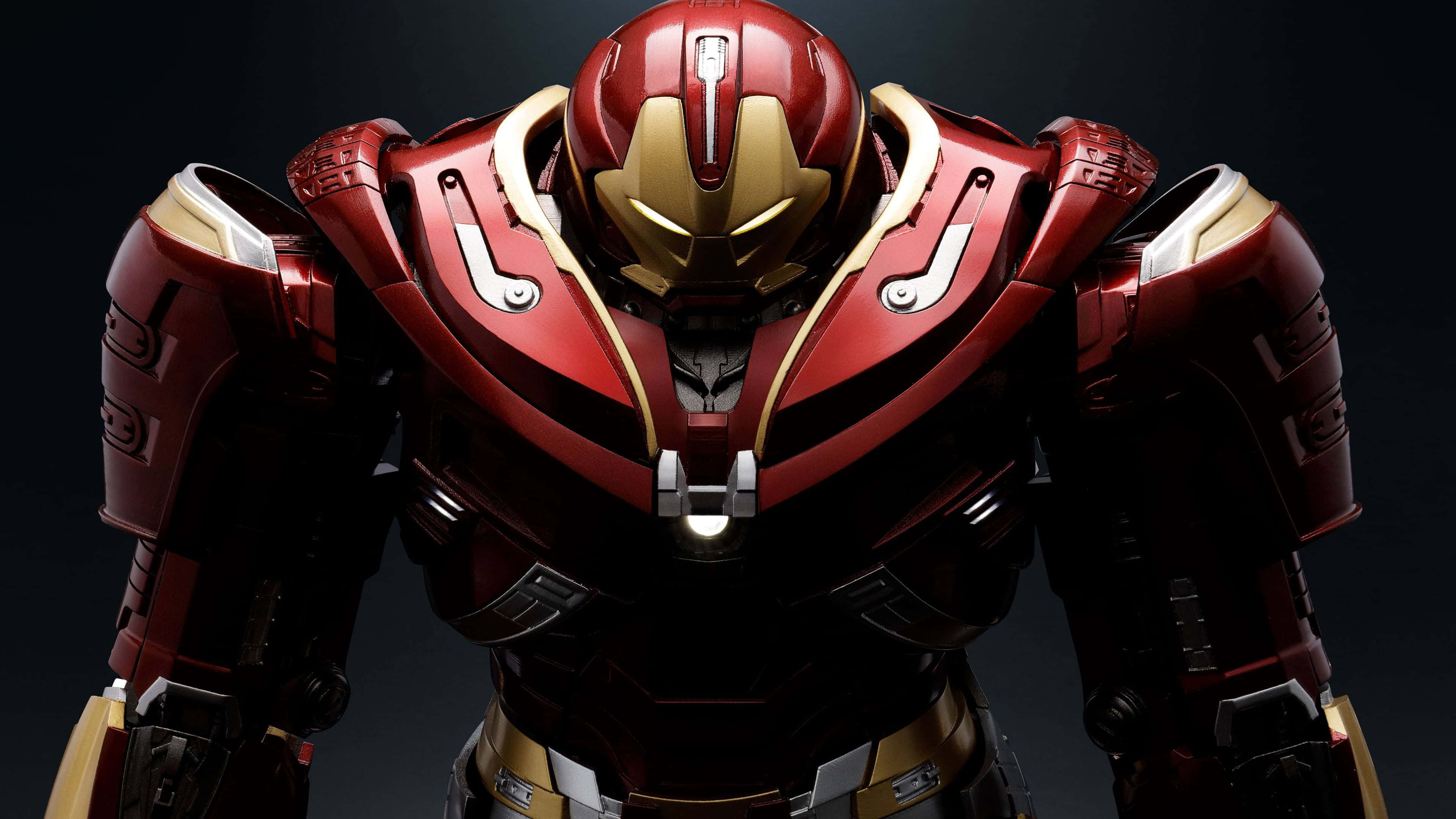 Iron Man, red and gold armored suit, glowing chest light, 4K Desktop Wallpaper