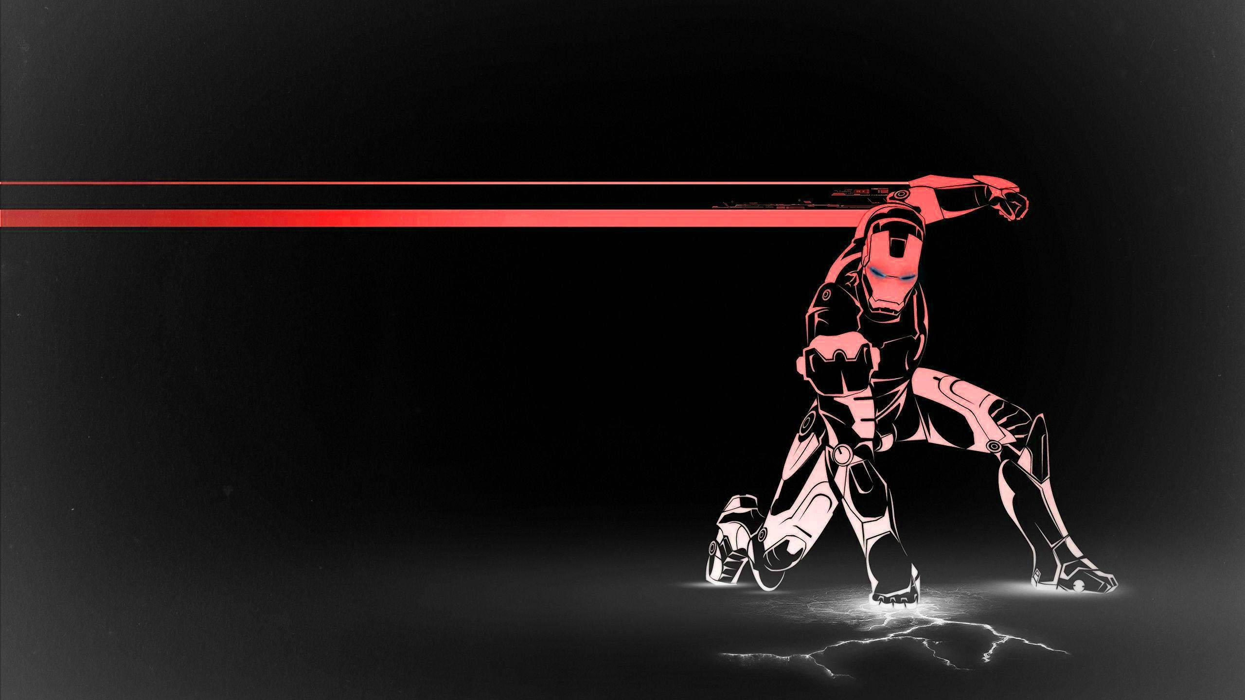 Iron Man, red and black armored figure, glowing red beam, 2K Desktop Wallpaper