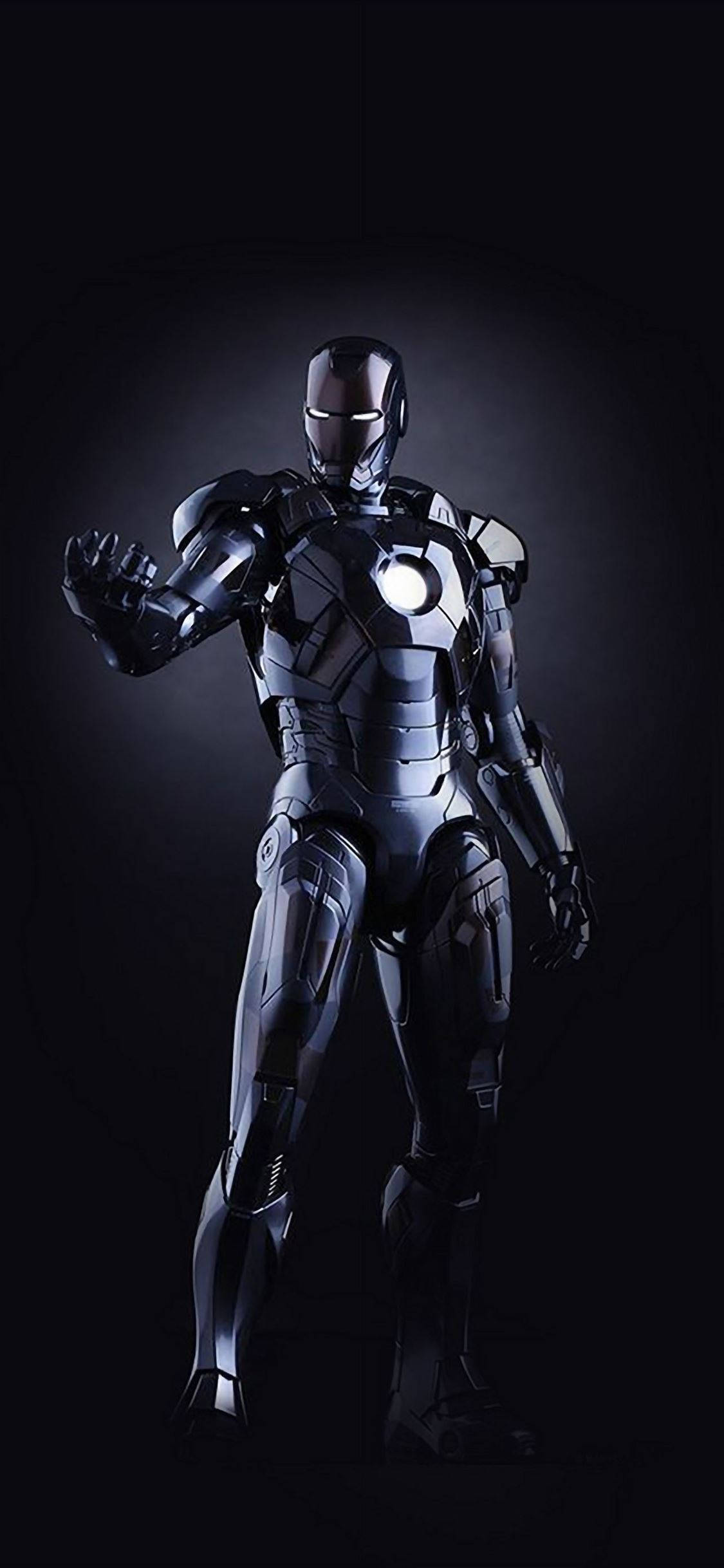 Iron Man, black armored suit, glowing arc reactor, Full HD Phone Wallpaper