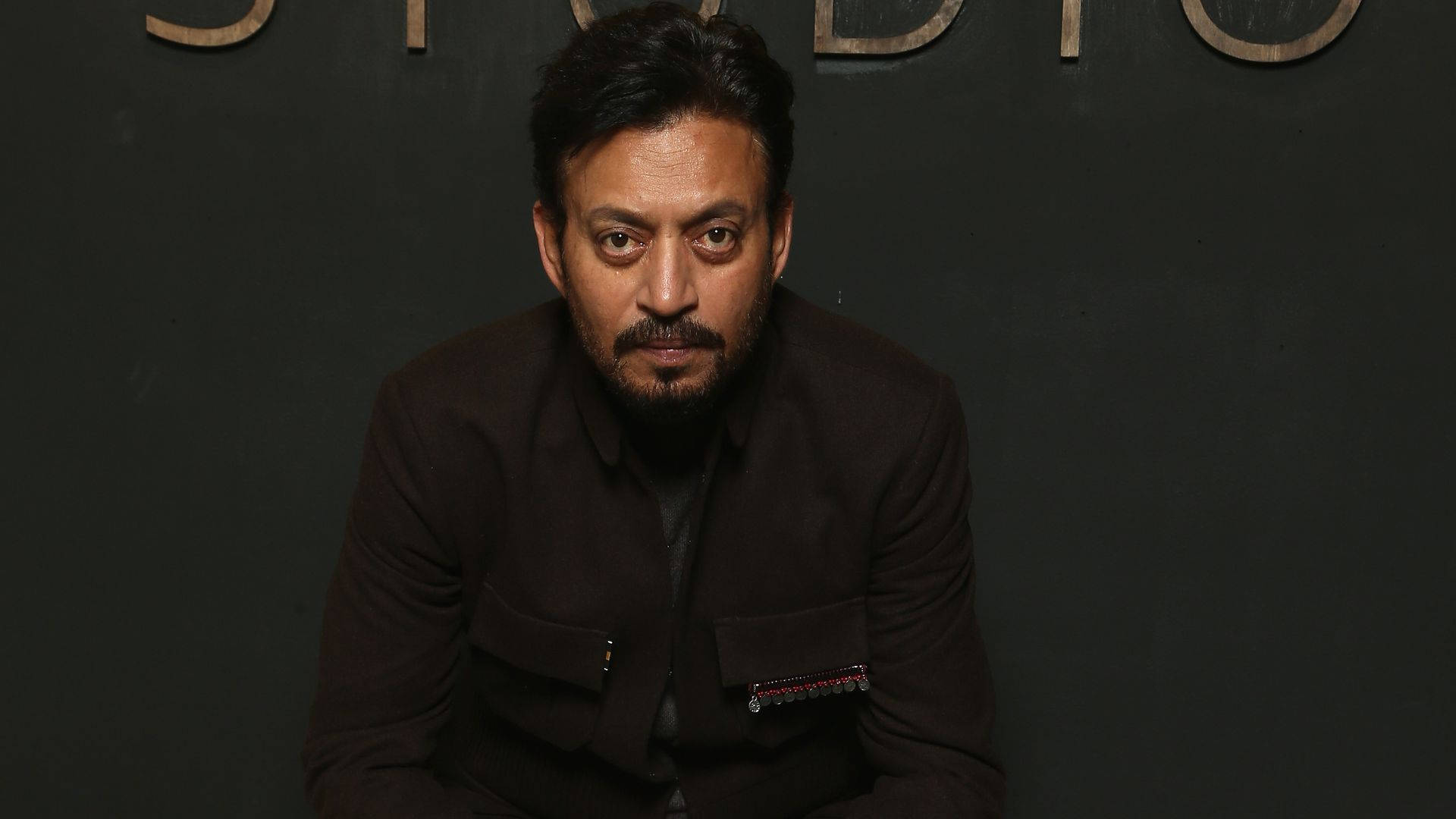 Irrfan Khan, dark brown jacket, black wall, Full HD Desktop Wallpaper