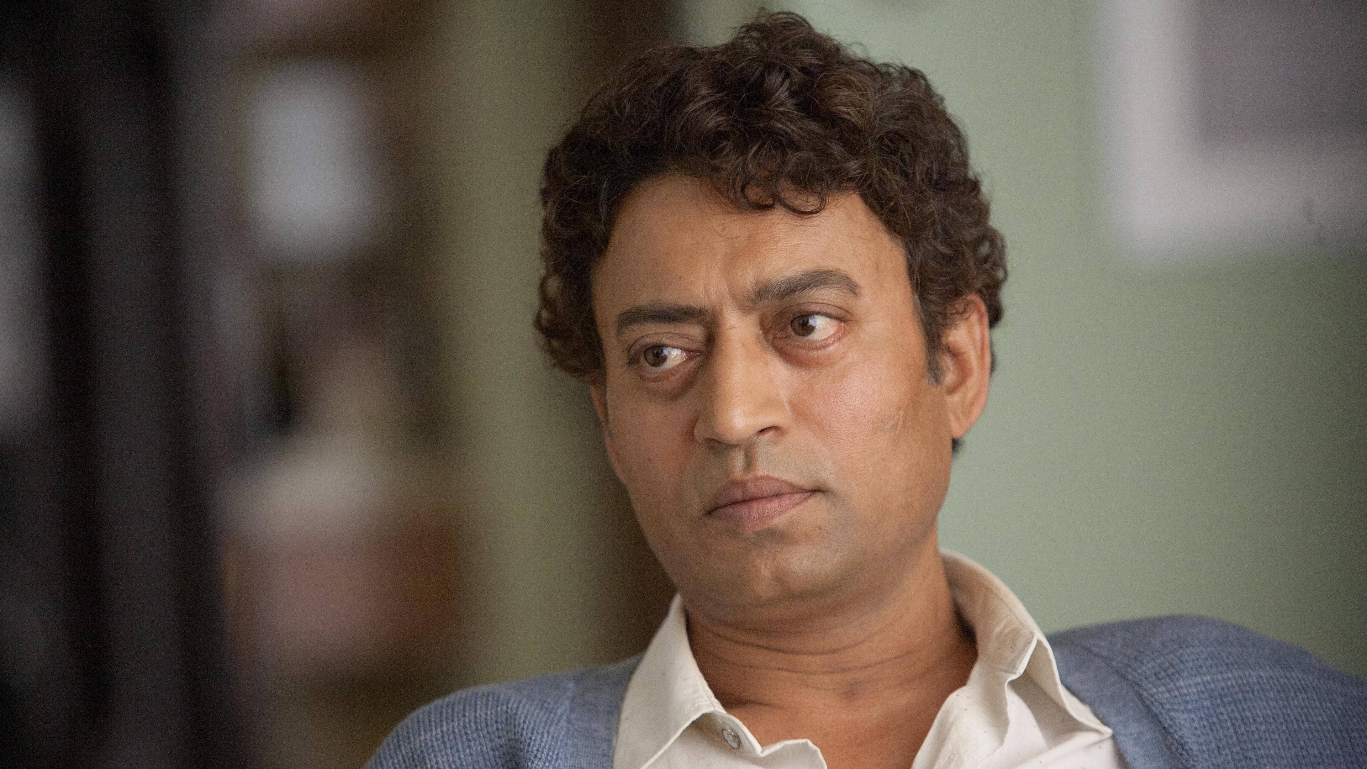 Irrfan Khan, curly dark hair, serious expression, 4K Desktop Wallpaper
