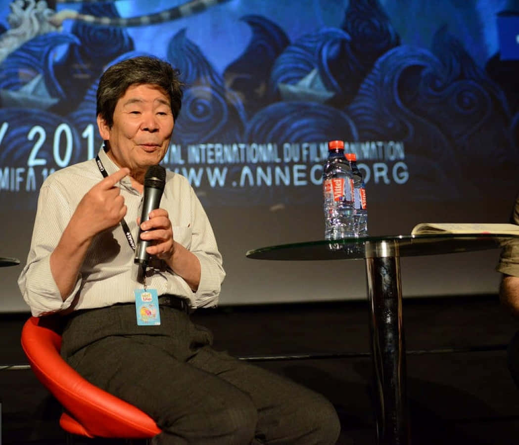 Isao Takahata, red chair, microphone, SD Desktop Wallpaper