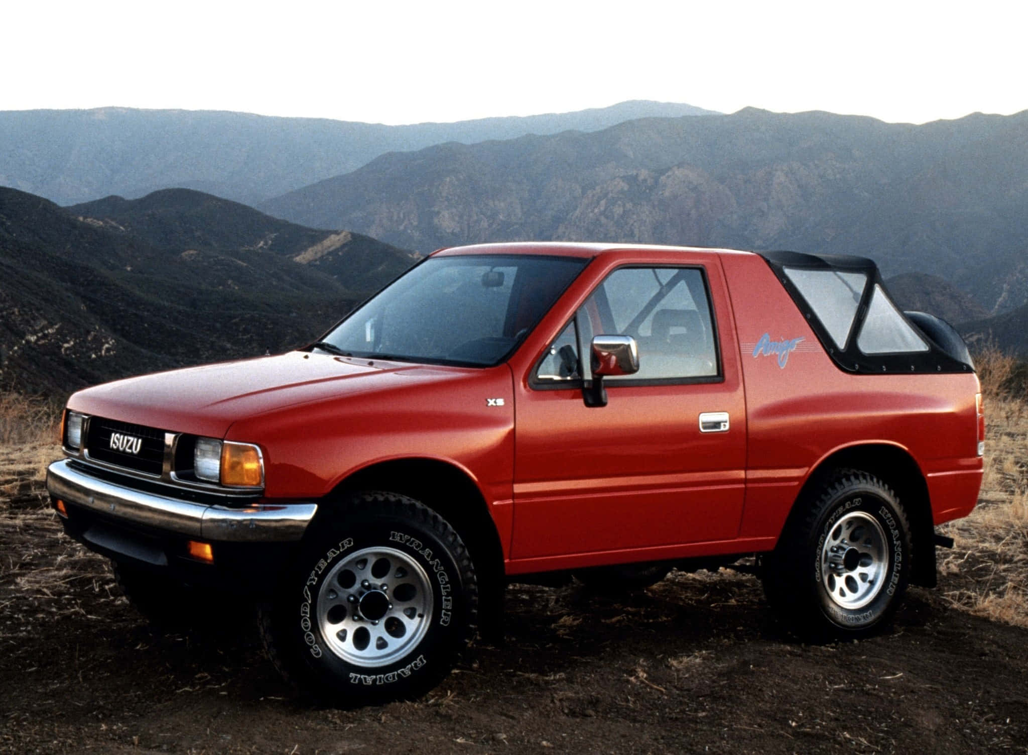 Isuzu Amigo, vibrant red, rugged terrain, Full HD Desktop Wallpaper