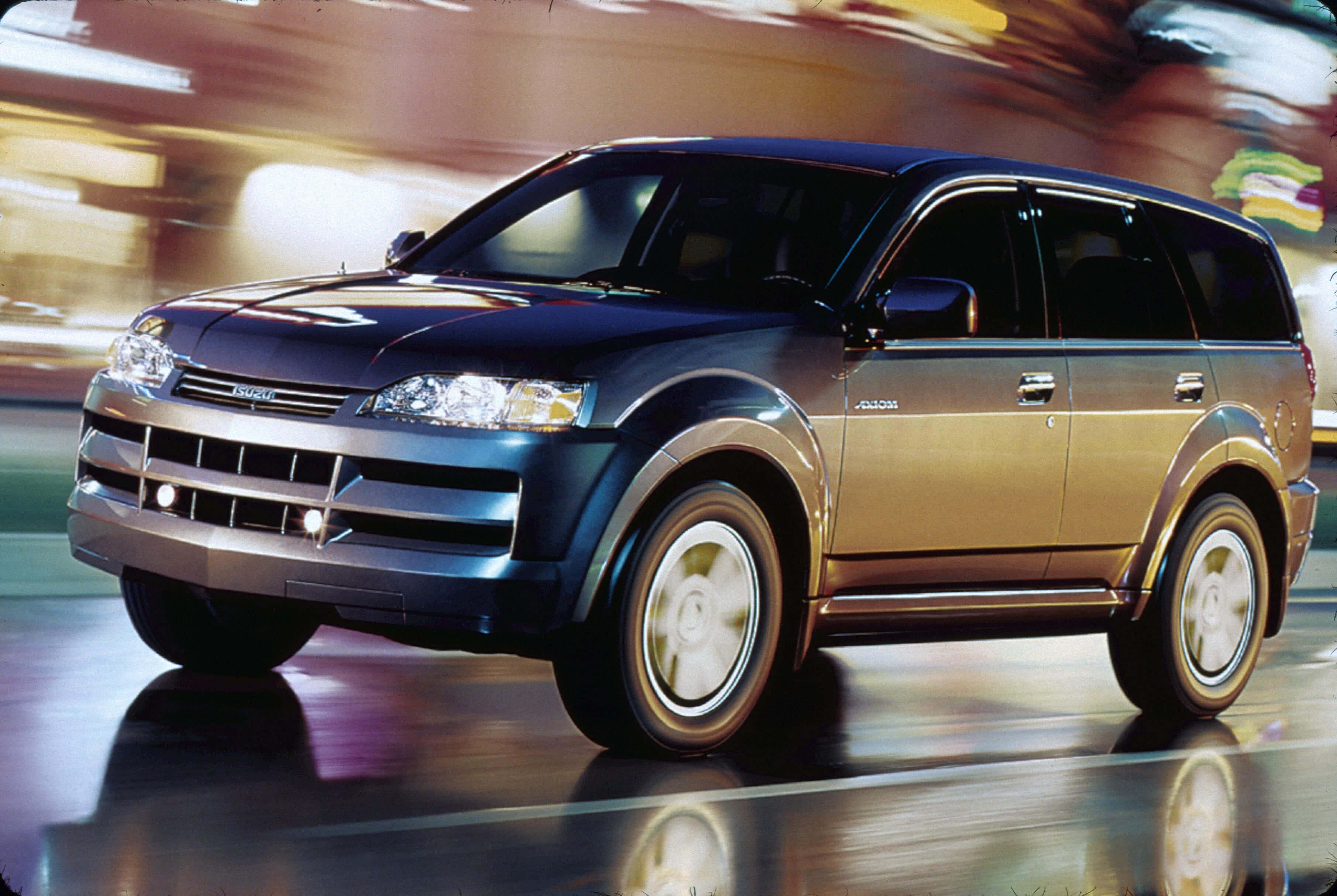 Isuzu Axiom, dark blue, gold trim, 2K Desktop Wallpaper
