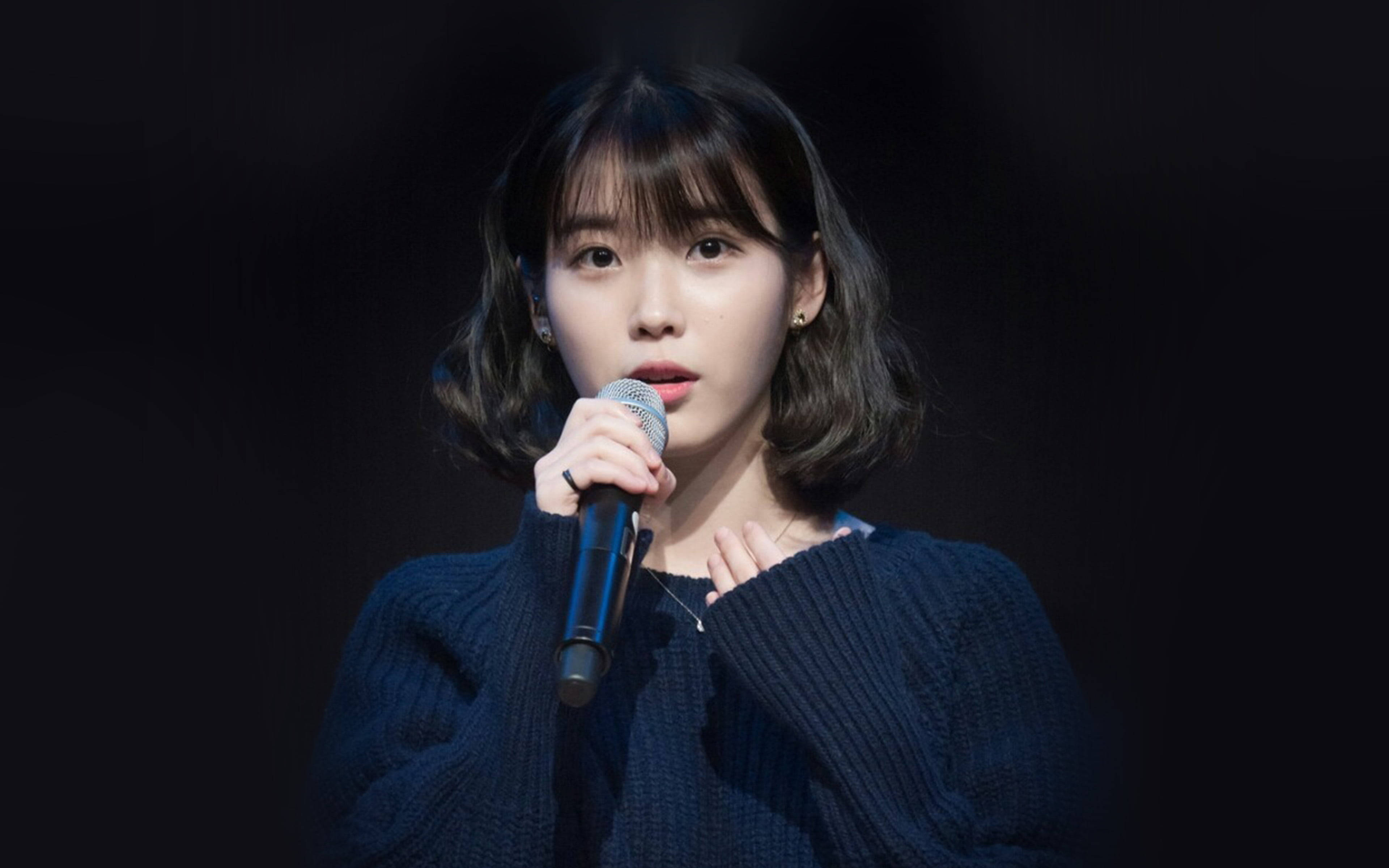 IU, black background, dark blue knit sweater, 4K Desktop Wallpaper