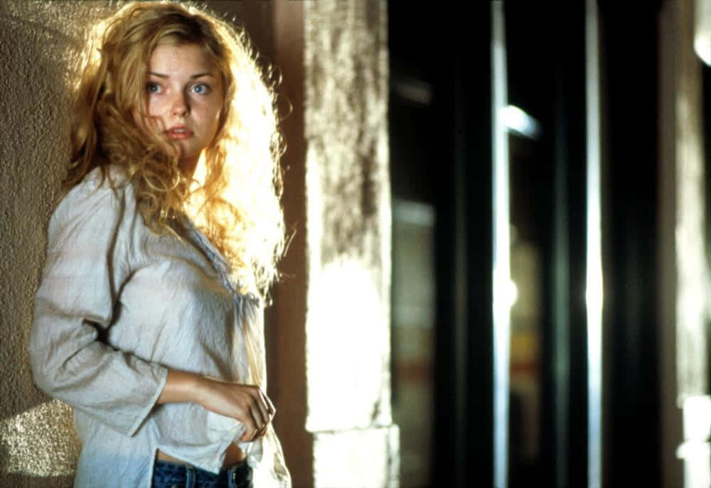 Izabella Miko, curly blonde hair, sunlit doorway, SD Desktop Wallpaper