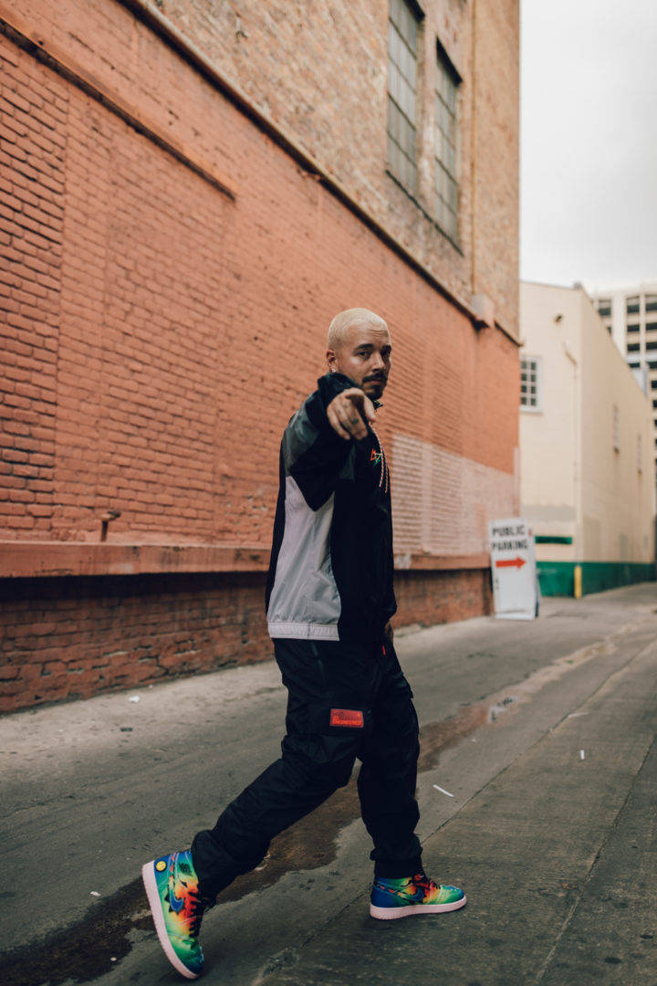 J Balvin, black jacket, vibrant tie-dye sneakers, SD Phone Wallpaper