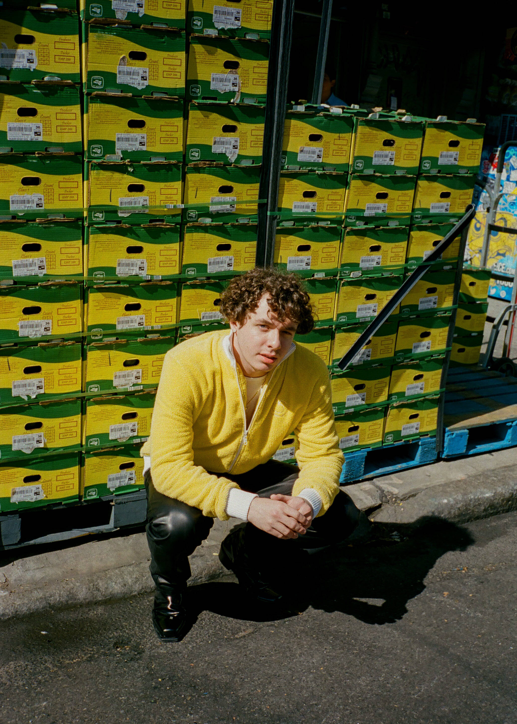 Jack Harlow, bright yellow sweater, green and yellow cardboard boxes, 2K Phone Wallpaper