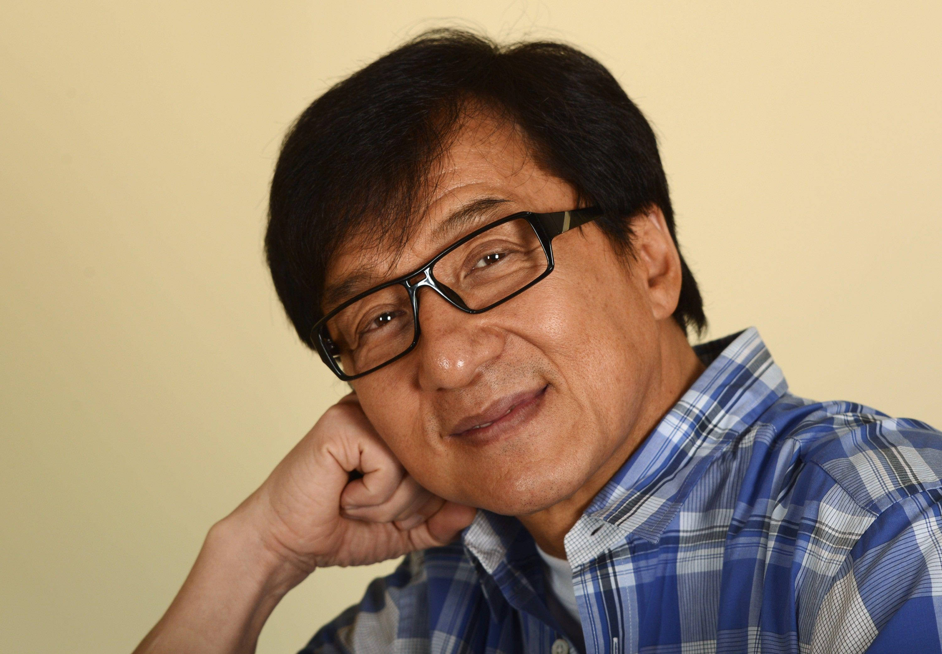 Jackie Chan, dark hair, glasses, 2K Desktop Wallpaper