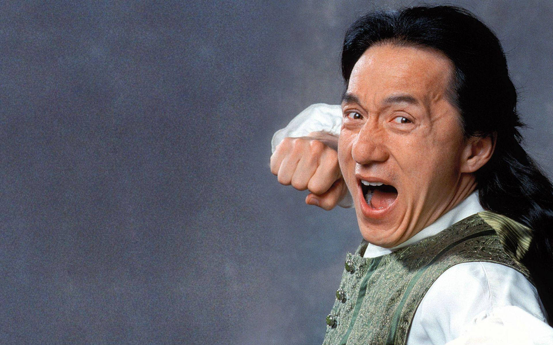 Jackie Chan, clenched fist, intense expression, Full HD Desktop Wallpaper