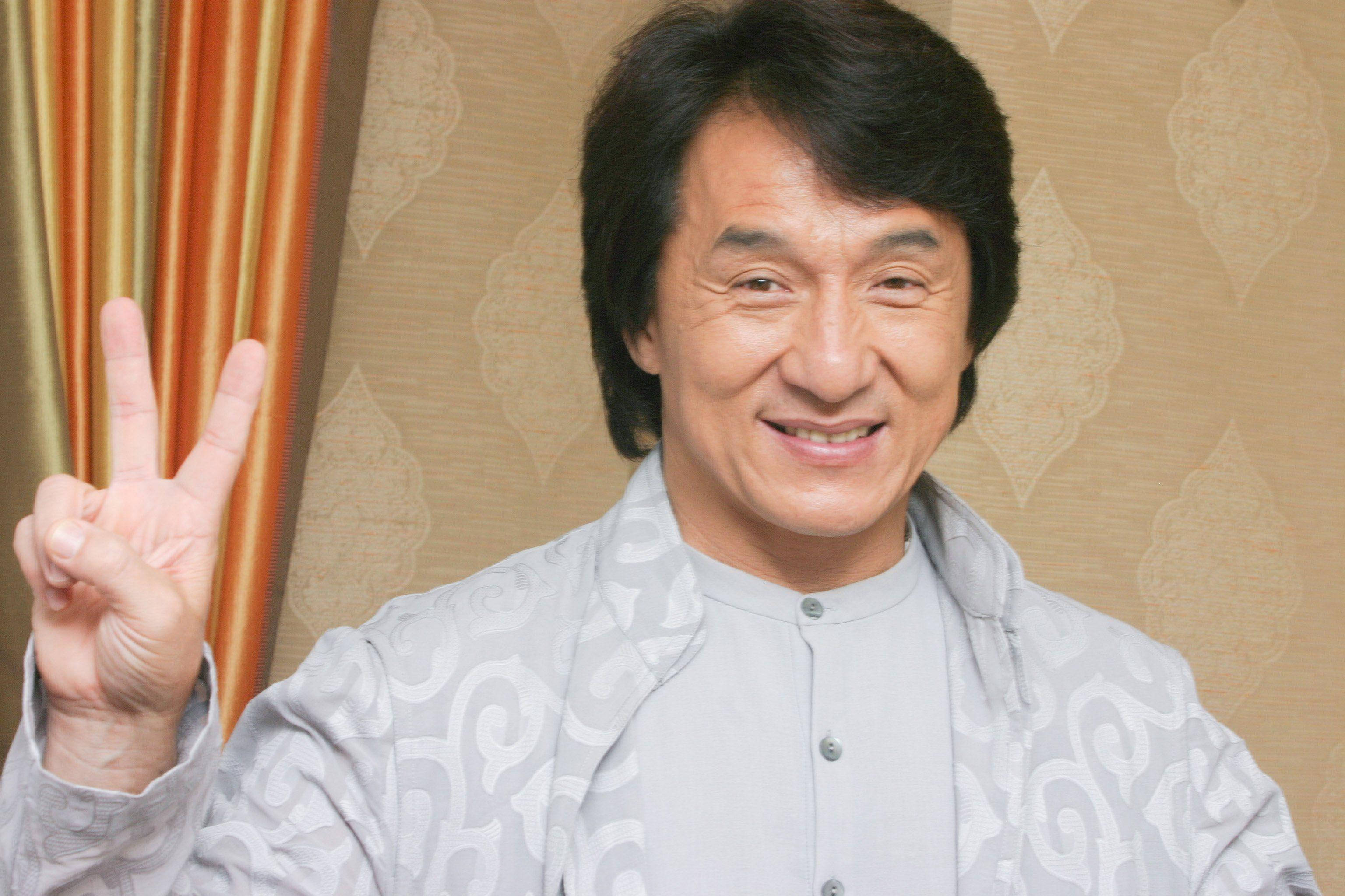 Jackie Chan, peace sign, patterned wallpaper, 2K Desktop Wallpaper