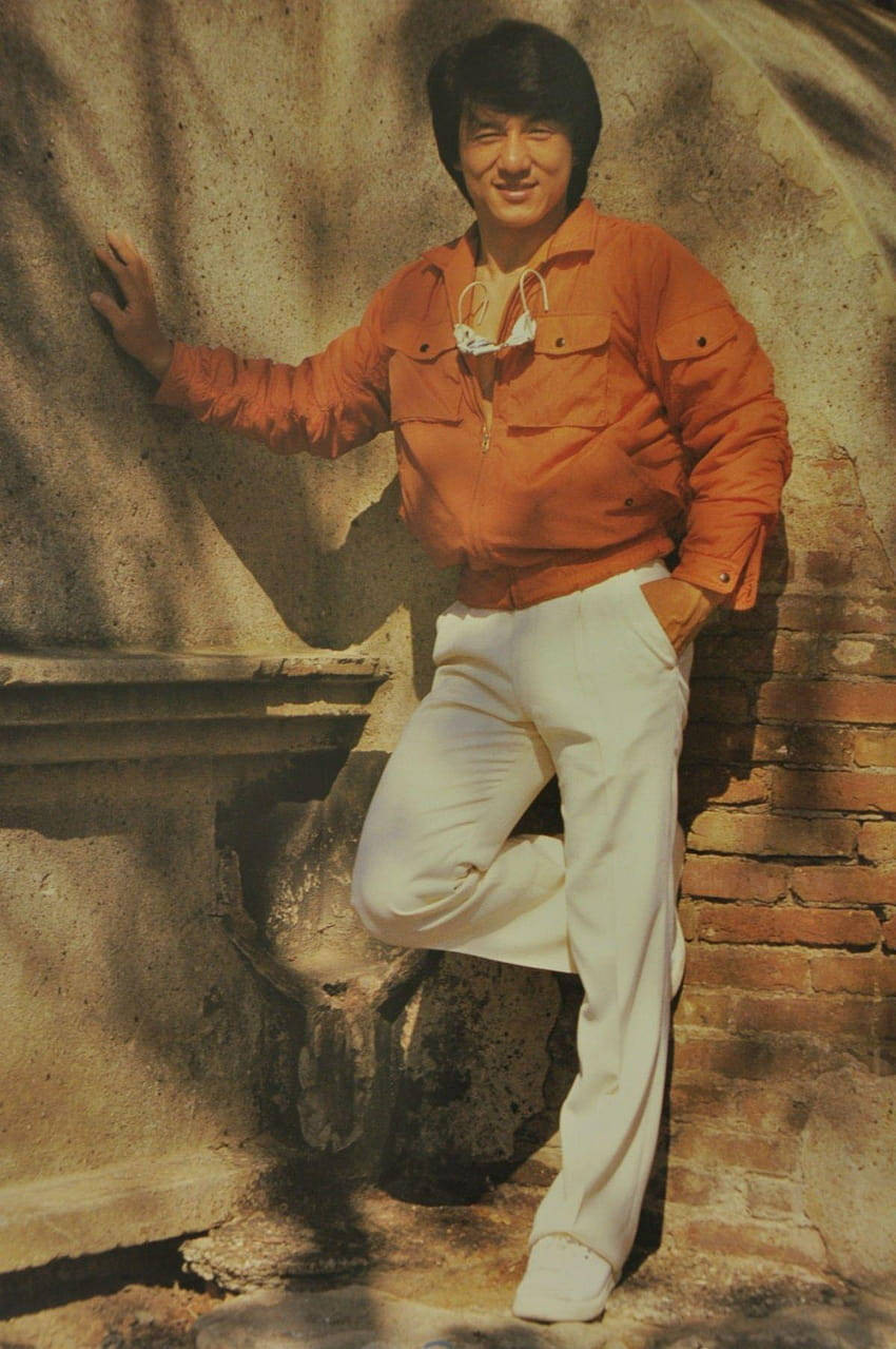 Jackie Chan, orange jacket, white pants, SD Phone Wallpaper