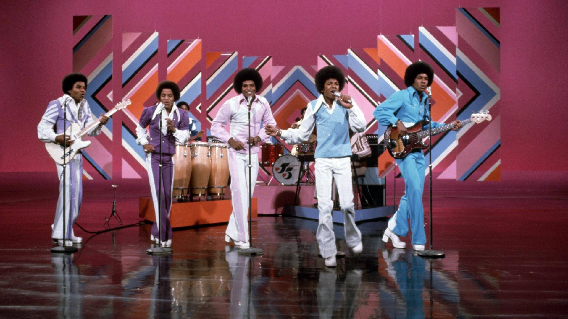 Jackson 5, vibrant stage, geometric pink and blue backdrops, Full HD Desktop Wallpaper