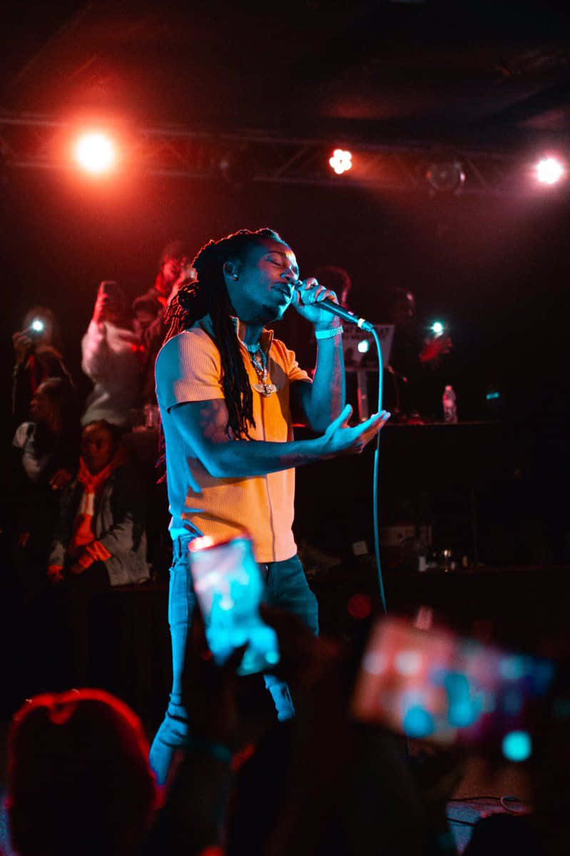 Jacquees, dreadlocks, red and blue stage lights, SD Phone Wallpaper