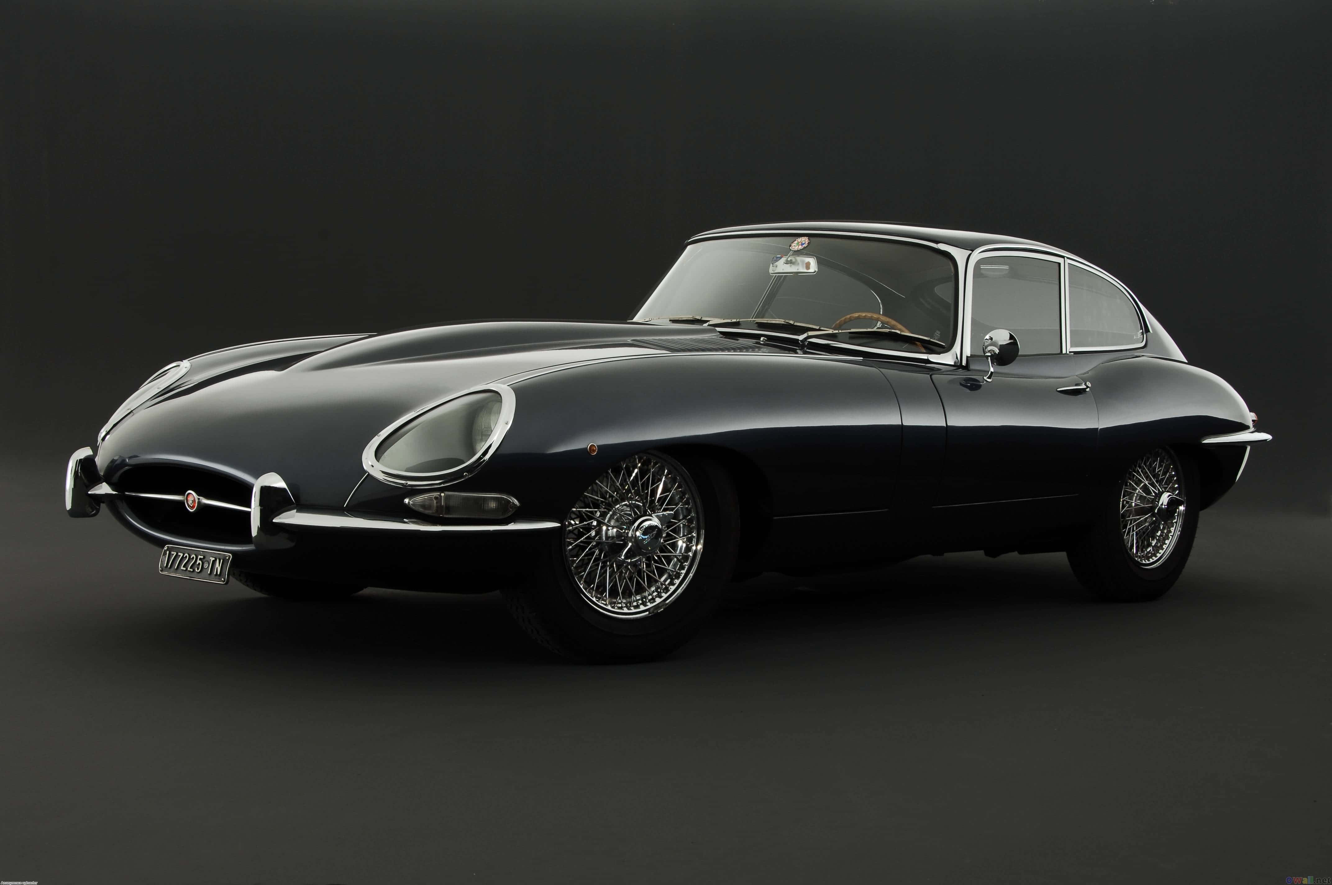 Jaguar E-Type, black, chrome wire wheels, 4K Desktop Wallpaper