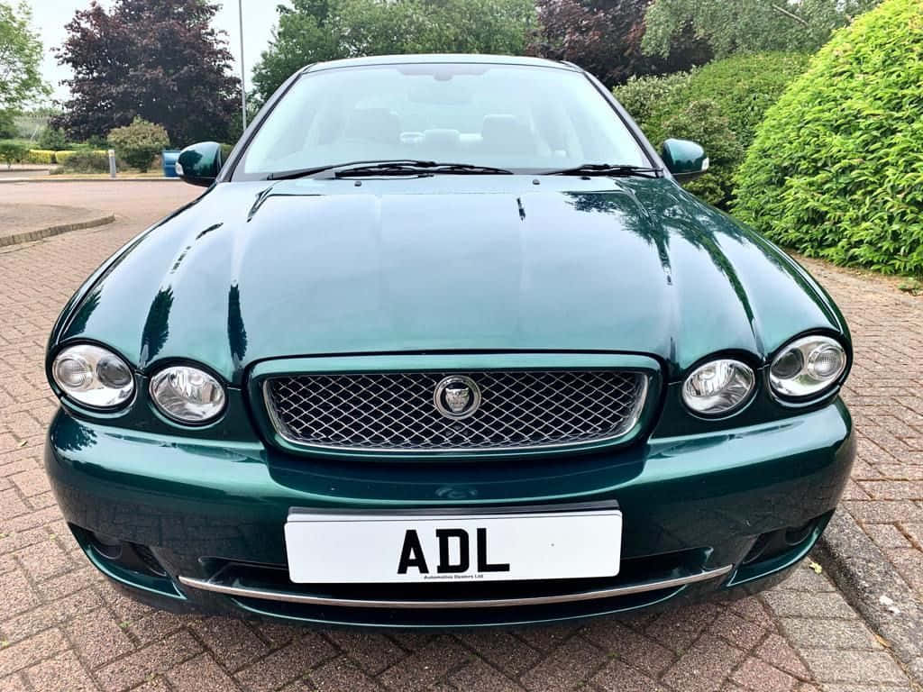 Jaguar X-Type, glossy green, brick driveway, SD Desktop Wallpaper