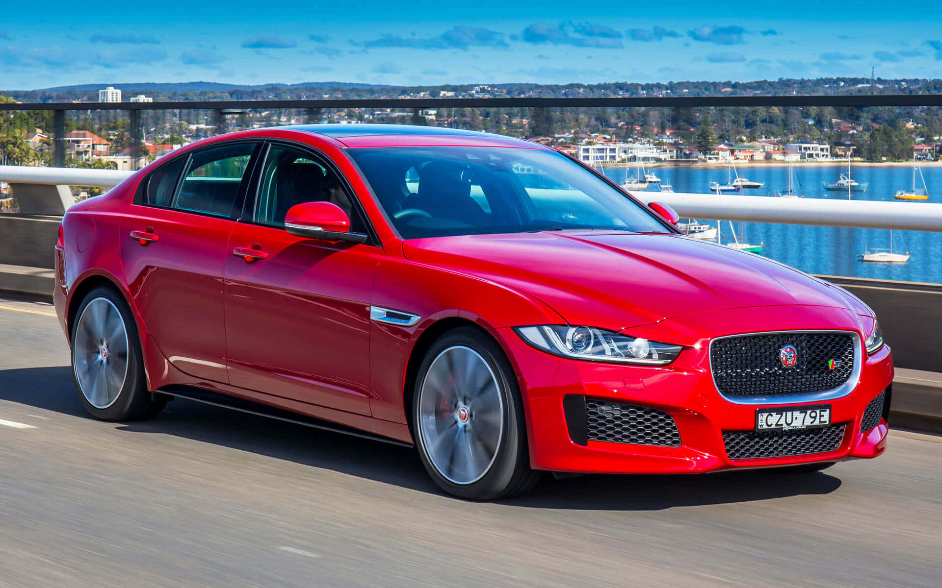 Jaguar XE, vibrant red, bridge, Full HD Desktop Wallpaper