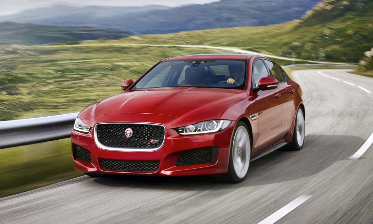 Jaguar XE S, vibrant red, winding mountain road, HD Desktop Wallpaper