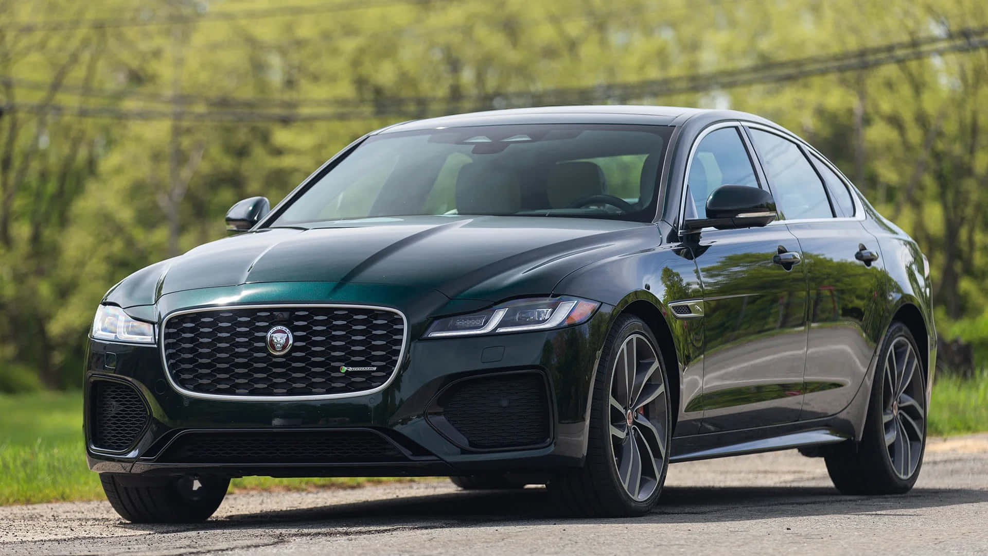 Jaguar XF, dark green, gravel road, Full HD Desktop Wallpaper