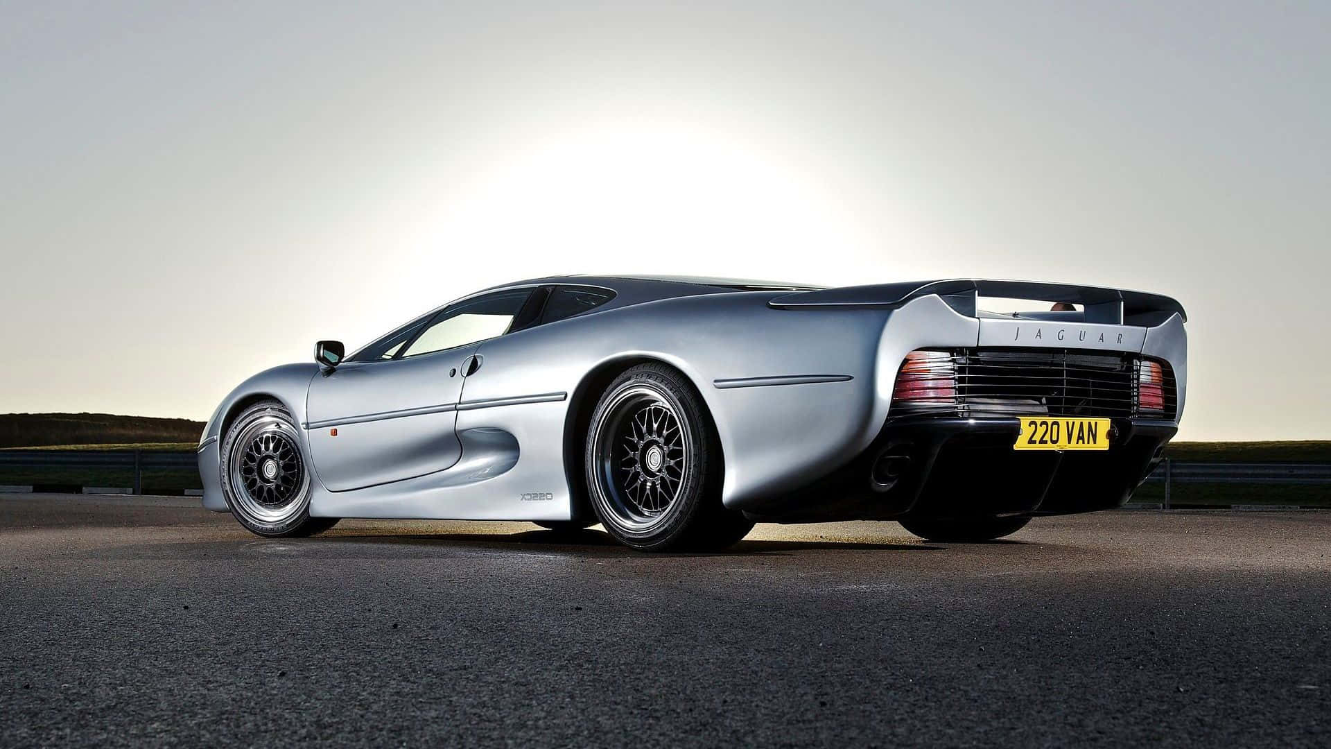Jaguar XJ220, sleek silver, asphalt road, Full HD Desktop Wallpaper