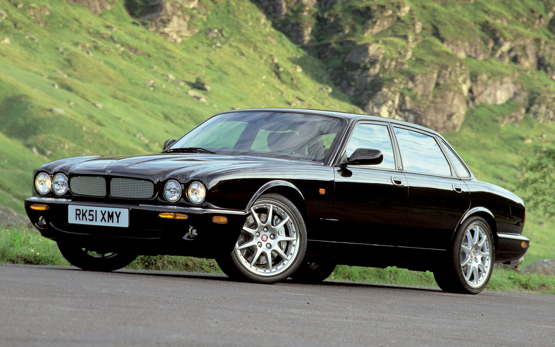 Jaguar XJR, black, winding mountain road, Full HD Desktop Wallpaper