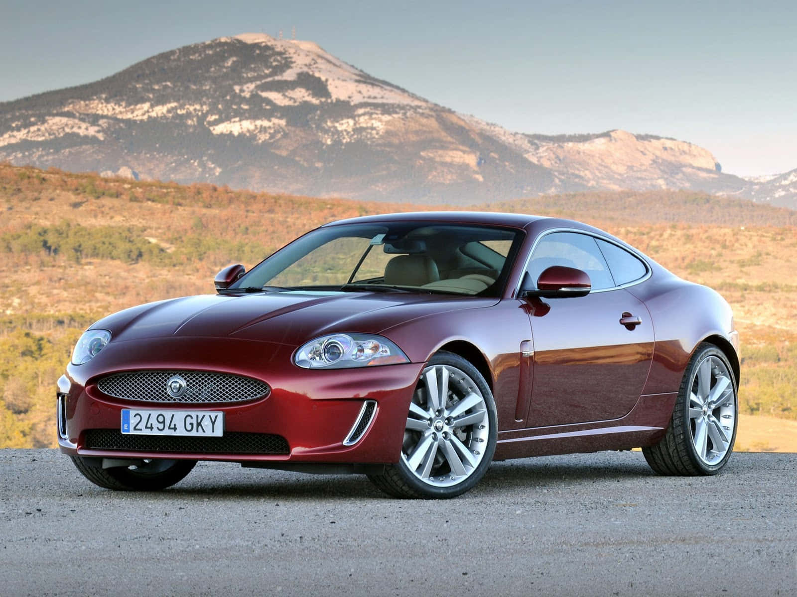 Jaguar XK, glossy red, gravel, HD Desktop Wallpaper