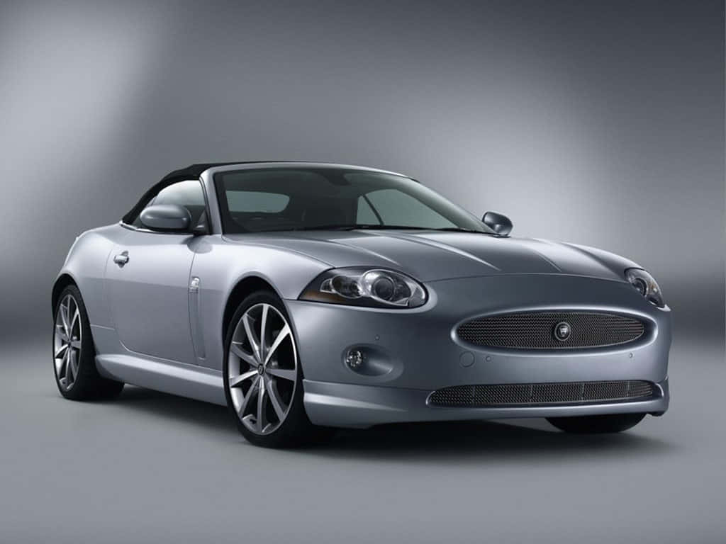 Jaguar XK, silver, black soft top, SD Desktop Wallpaper