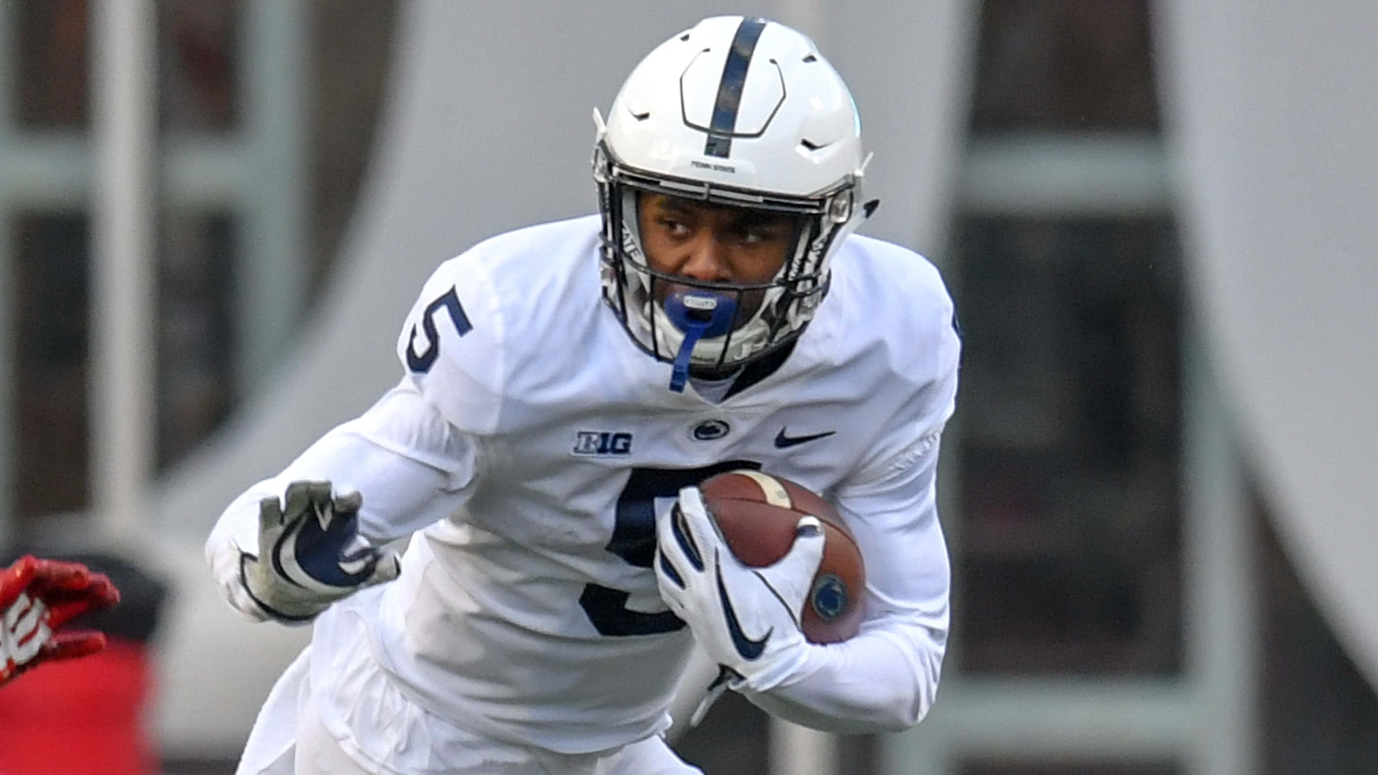 Penn State football player, white uniform, running with the ball, 2K Desktop Wallpaper