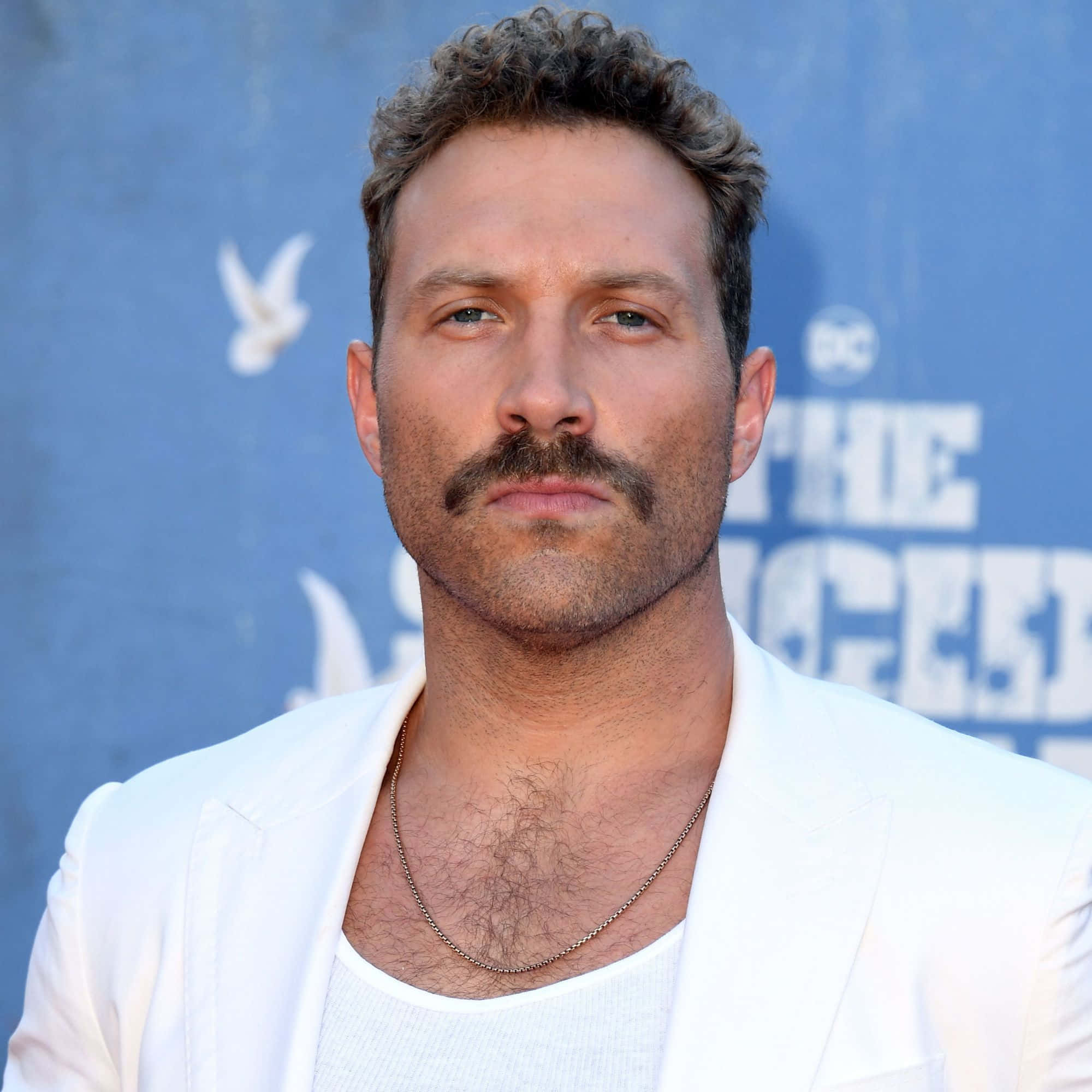 Jai Courtney, white blazer, blue backdrop, Full HD Desktop Wallpaper
