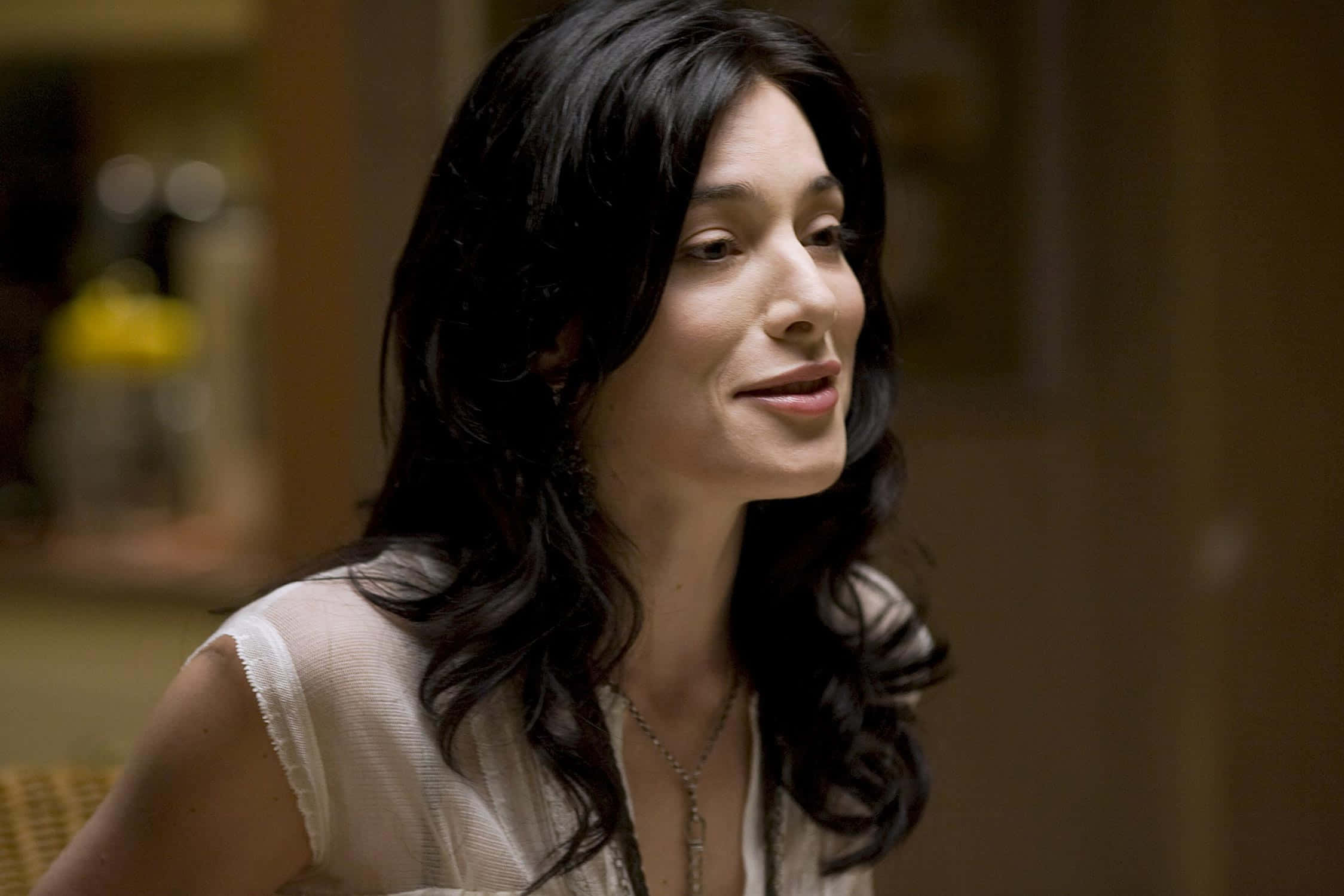 Jaime Murray, dark wavy hair, warmly lit indoor setting, Full HD Desktop Wallpaper