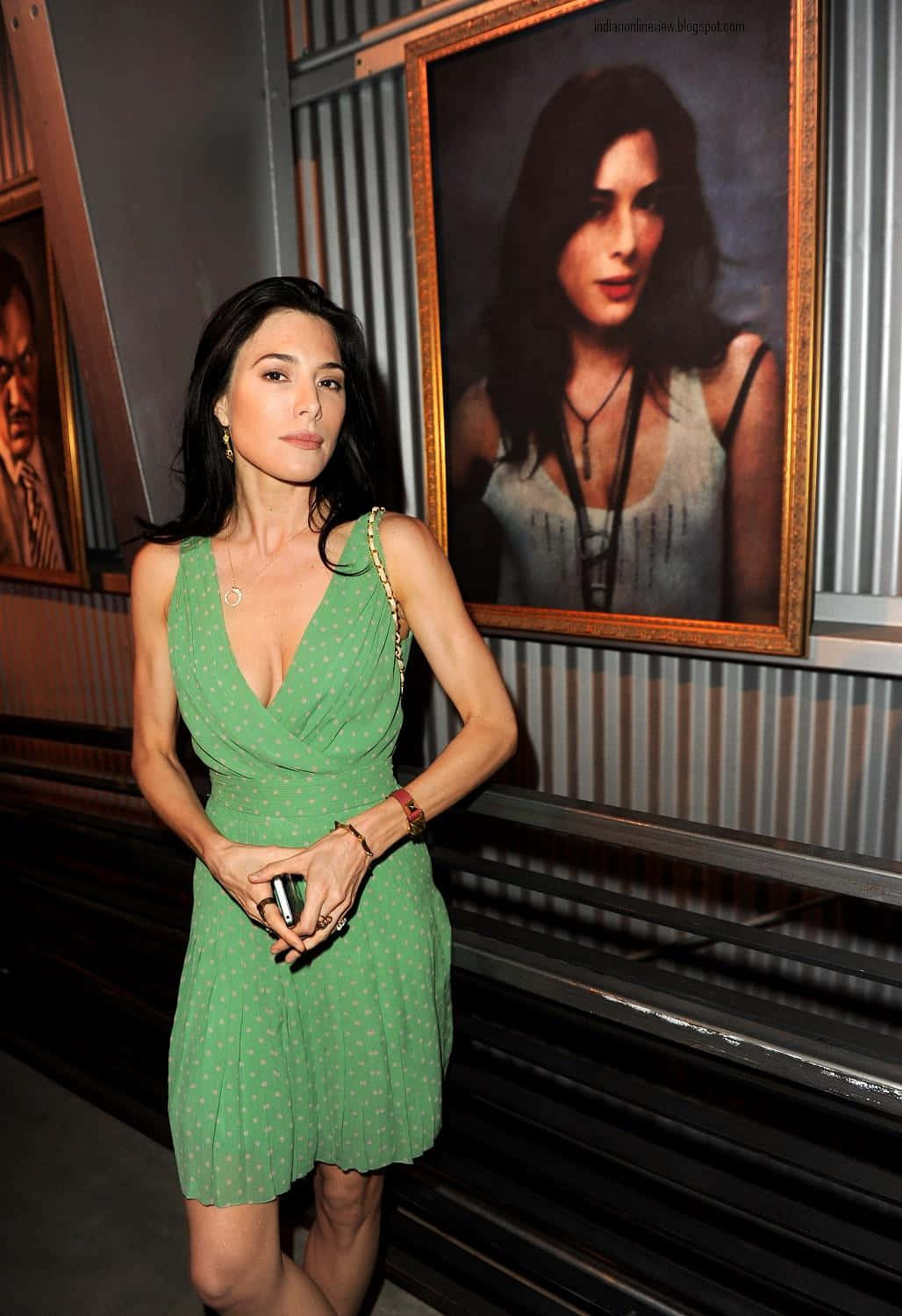 Jaime Murray, green polka-dot dress, dimly lit gallery, HD Phone Wallpaper