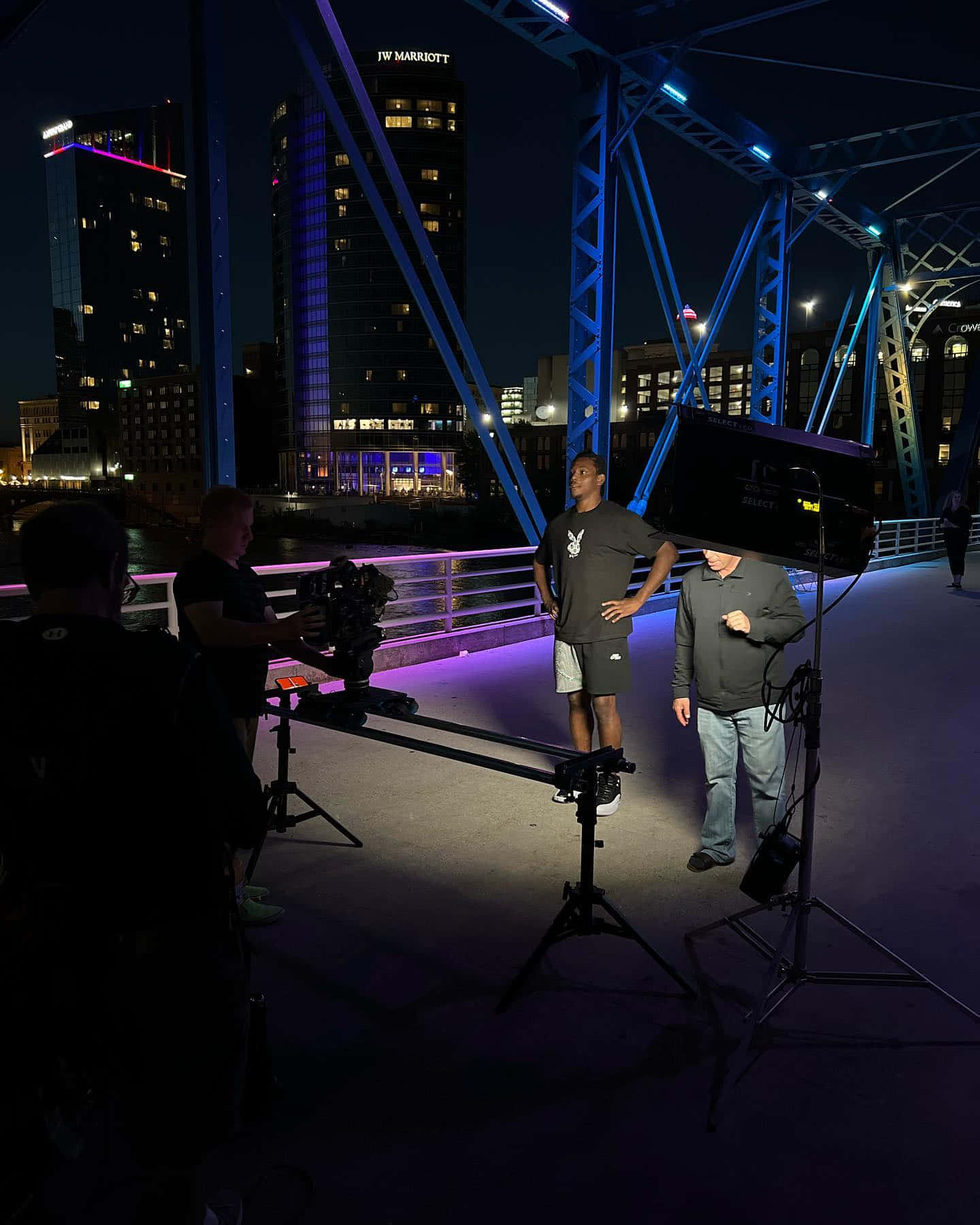 Jamahal Hill, Nighttime urban bridge scene, dramatic blue and purple lighting, HD Phone Wallpaper
